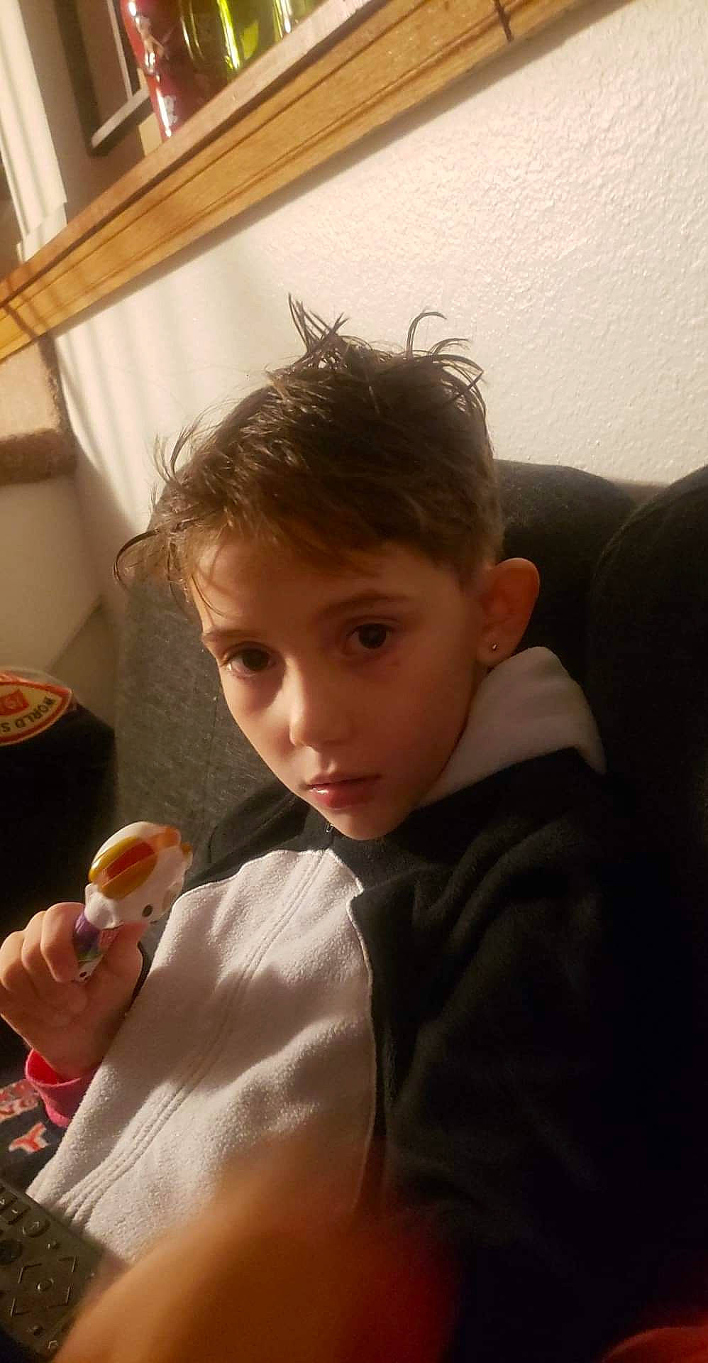 Ily joined the competition — help win amazing prizes! brown_hair, chair, child, comfort, curtain, eyelash, fun, happy, lip, nose, person, picture_frame, room, sitting, tableware, tie, toddler, vacation, window