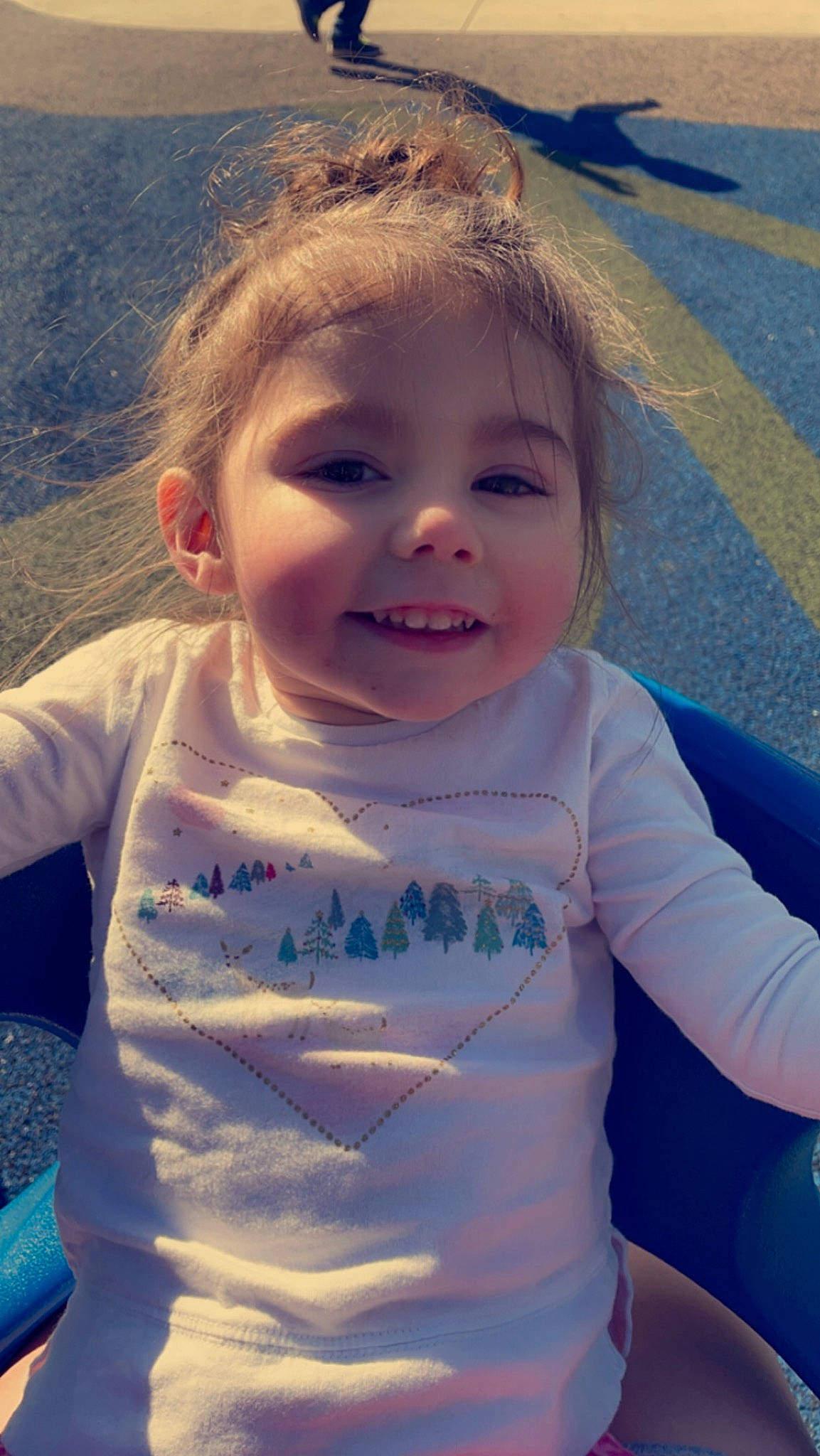 Bailey is registered to the contest to win money with this photo: azure, baby_toddler_clothing, blue, cheek, chin, cool, gesture, hairstyle, happy, head, iris, lip, mouth, nose, organ, person, pink, skin, sleeve, smile