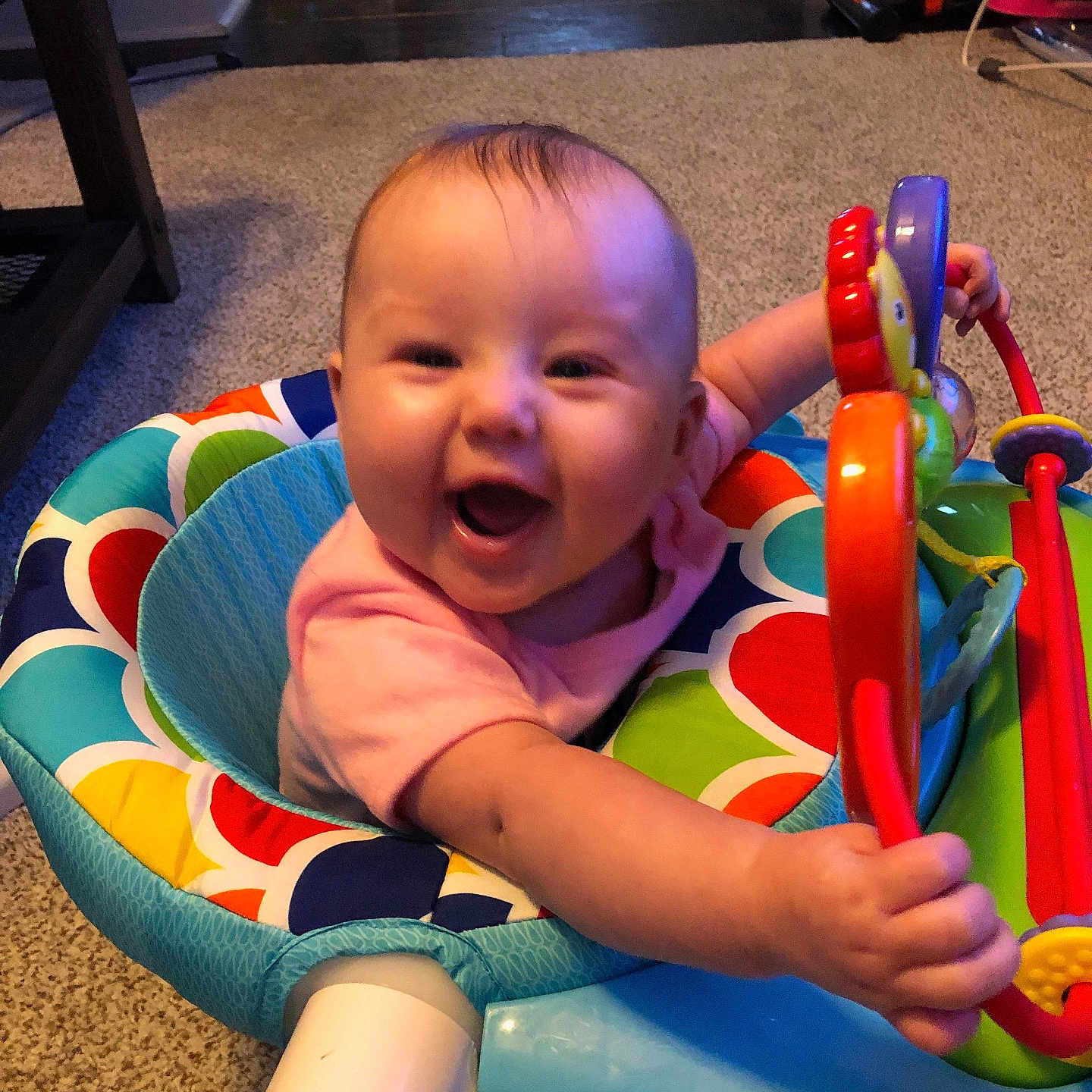 Emelia joined the competition — help win amazing prizes! baby, clothing, couch, cutlery, face, furniture, happy, head, indoors, laughing, person, photography, plant, playarea, portrait, pottedplant, sitting, spoon, t_shirt, toy