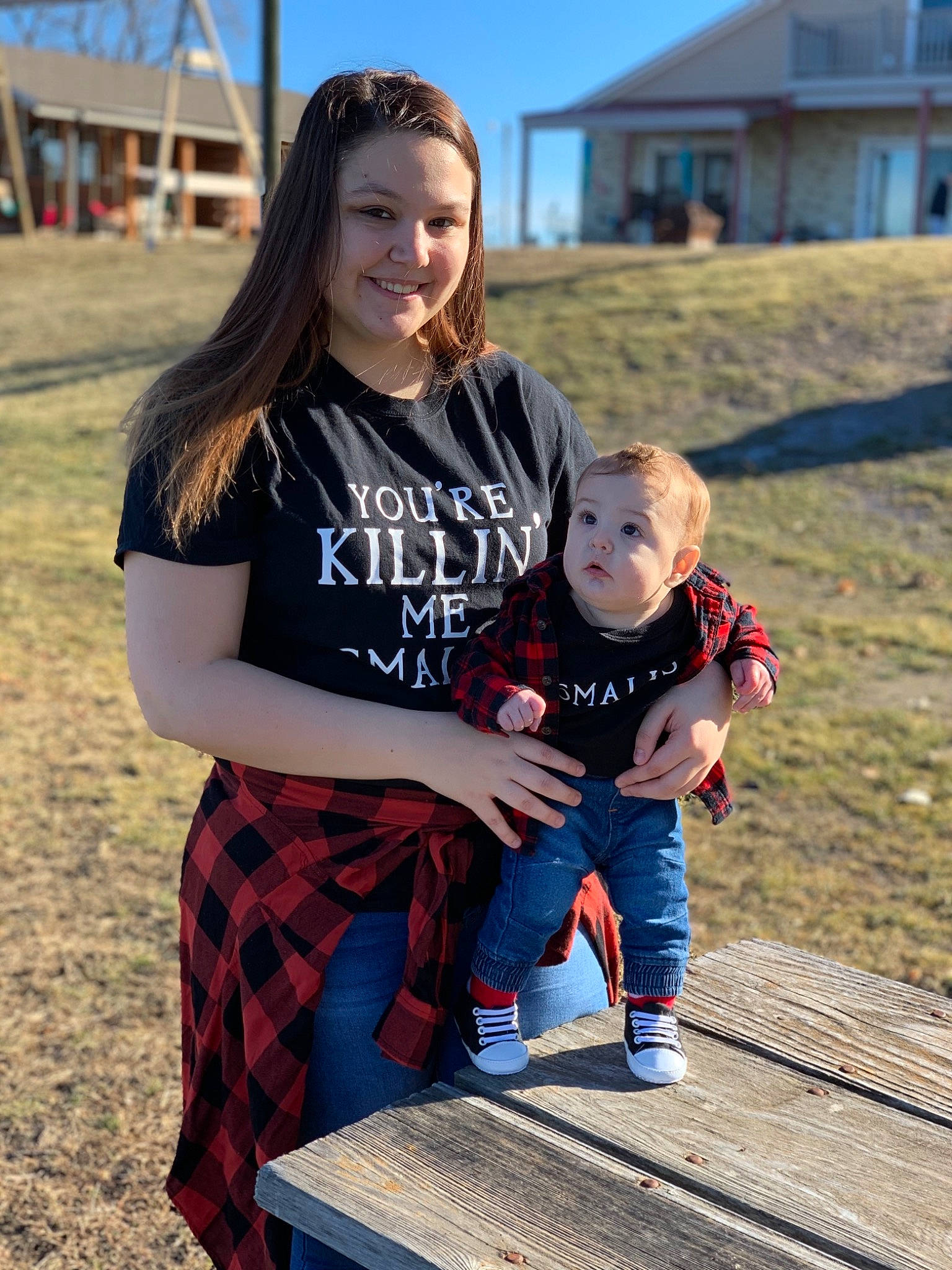 Daxton is registered to the contest to win money with this photo: child, design, fun, happy, joy, pattern, people, person, photography, plaid, sitting, smile, style, surprise, t_shirt, tartan, textile, toddler, tree, vacation