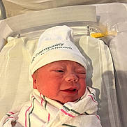 Rosaleigh joined the competition — help win amazing prizes! baby, bassinet, bed, blanket, cute, face, hat, healthcare, hospital, hospital_room, infant, lying, maternity, newborn, newborn_baby, person, skin, sleepy, swaddled, wrapped