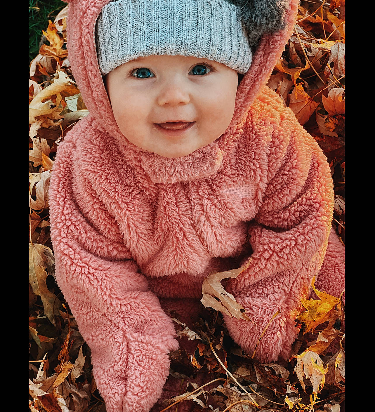 Blayke joined the competition — help win amazing prizes! baby, baby_toddler_clothing, cap, child, clothing, eye, fashion_accessory, grass, happy, headgear, headwear, joy, knit_cap, outerwear, pattern, people_in_nature, person, sitting, sleeve, smile
