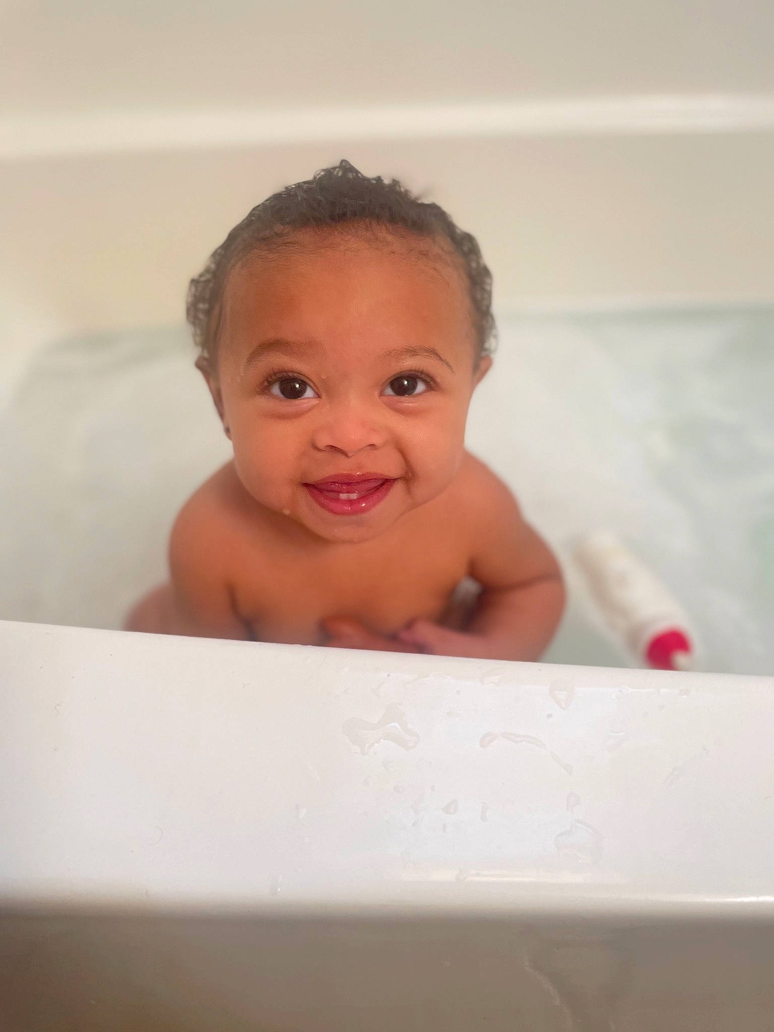 Layla joined the competition — help win amazing prizes! baby, baby_bathing, bathing, bathroom, bathtub, cheek, eye, eyebrow, eyelash, fluid, fun, hair, head, human_body, iris, joy, nose, person, skin, smile