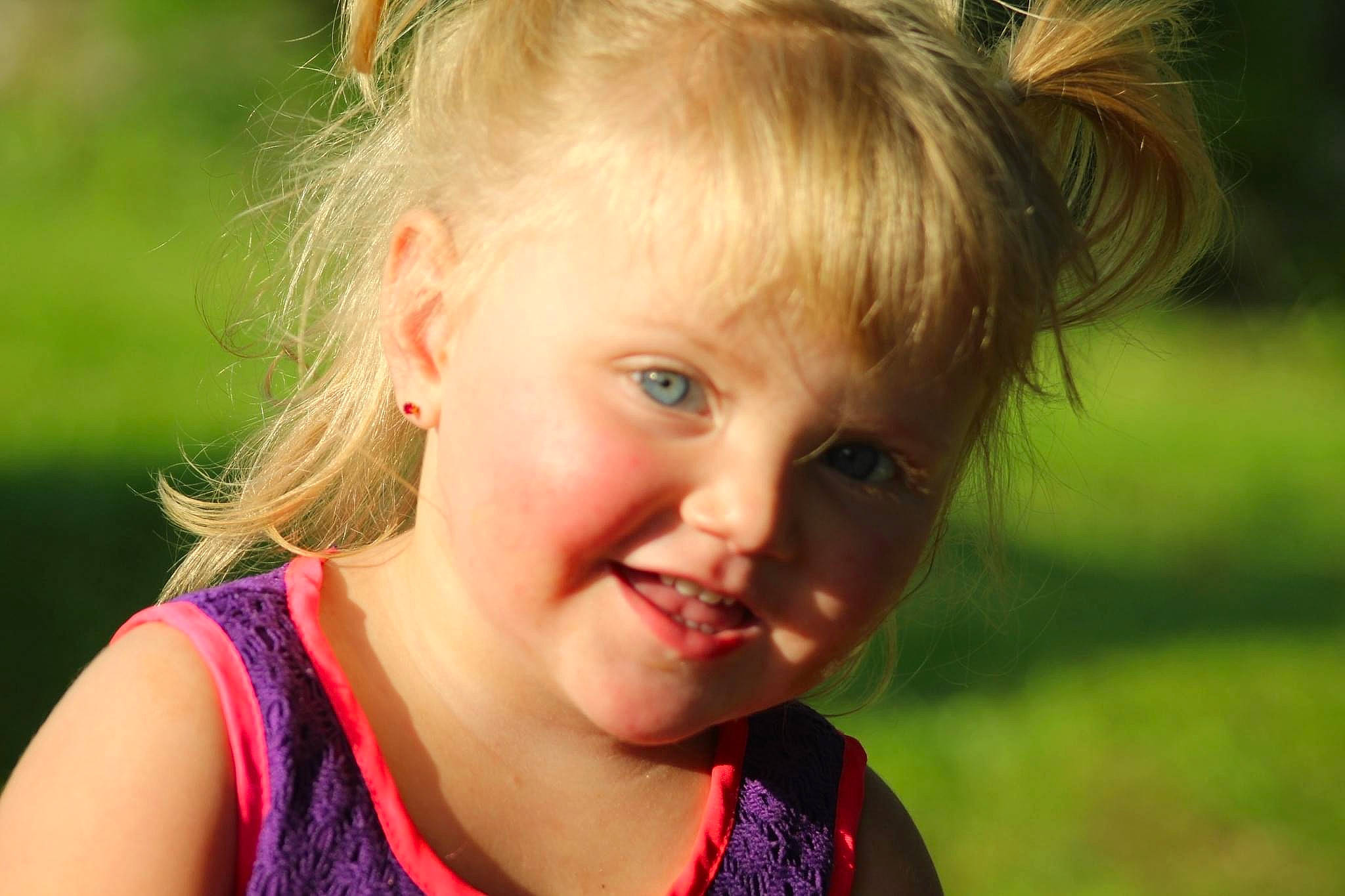 Ivery is registered to the contest to win money with this photo: beauty, cheek, ear, eyelash, face, fun, grass, hair, happy, iris, joy, lip, nose, people_in_nature, person, plant, skin, smile, summer, sunlight