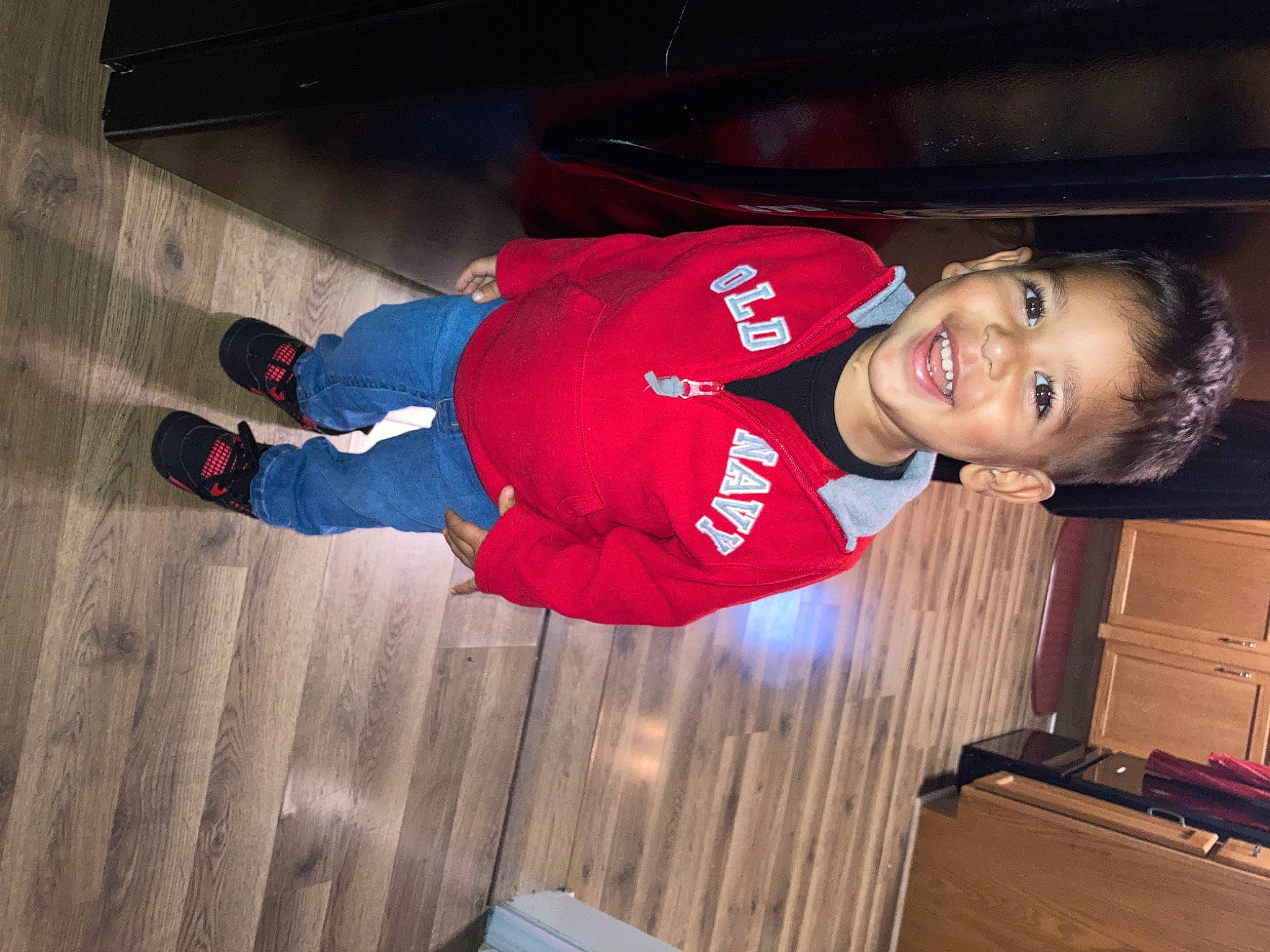 Marcell joined the competition — help win amazing prizes! box, carmine, child, electric_blue, flash_photography, flooring, fun, hardwood, joy, person, recreation, shipping_box, smile, sports, sports_uniform, sportswear, t_shirt, toddler, uniform, wood