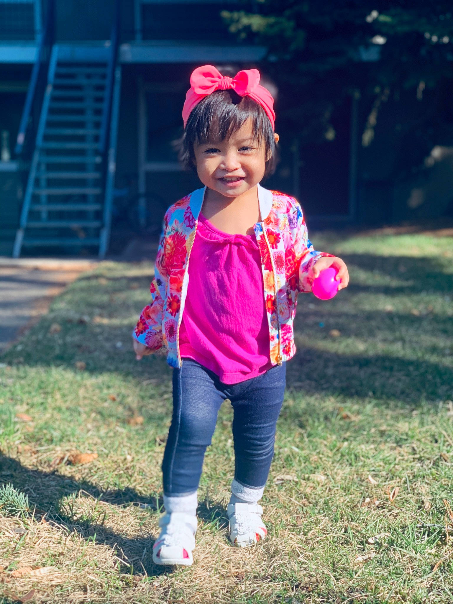 Ayda is registered to the contest to win money with this photo: beauty, child, child_model, flower, fun, grass, happy, leisure, outerwear, people, person, photography, pink, plant, play, recreation, skin, smile, snapshot, toddler