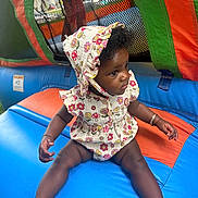 Milani joined the competition — help win amazing prizes! accessories, baby, bonnet, bracelet, clothing, coat, face, hat, head, indoors, inflatable, jewelry, outdoorplayarea, outdoors, person, photography, playarea, portrait, sitting, slide