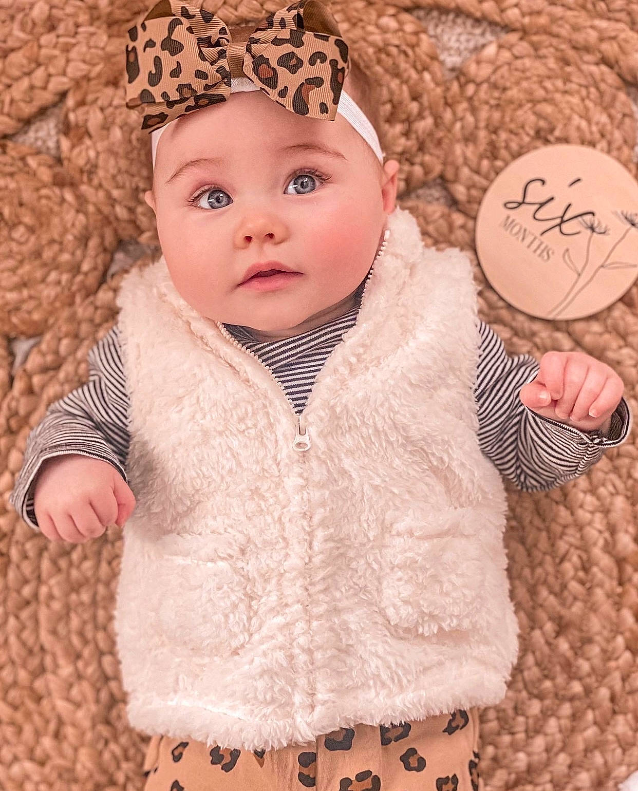 Maggie is registered to the contest to win money with this photo: baby_toddler_clothing, cap, cheek, clothing, face, finger, hand, head, headgear, headwear, jacket, lip, mammal, organ, outerwear, person, pink, product, skin, sleeve