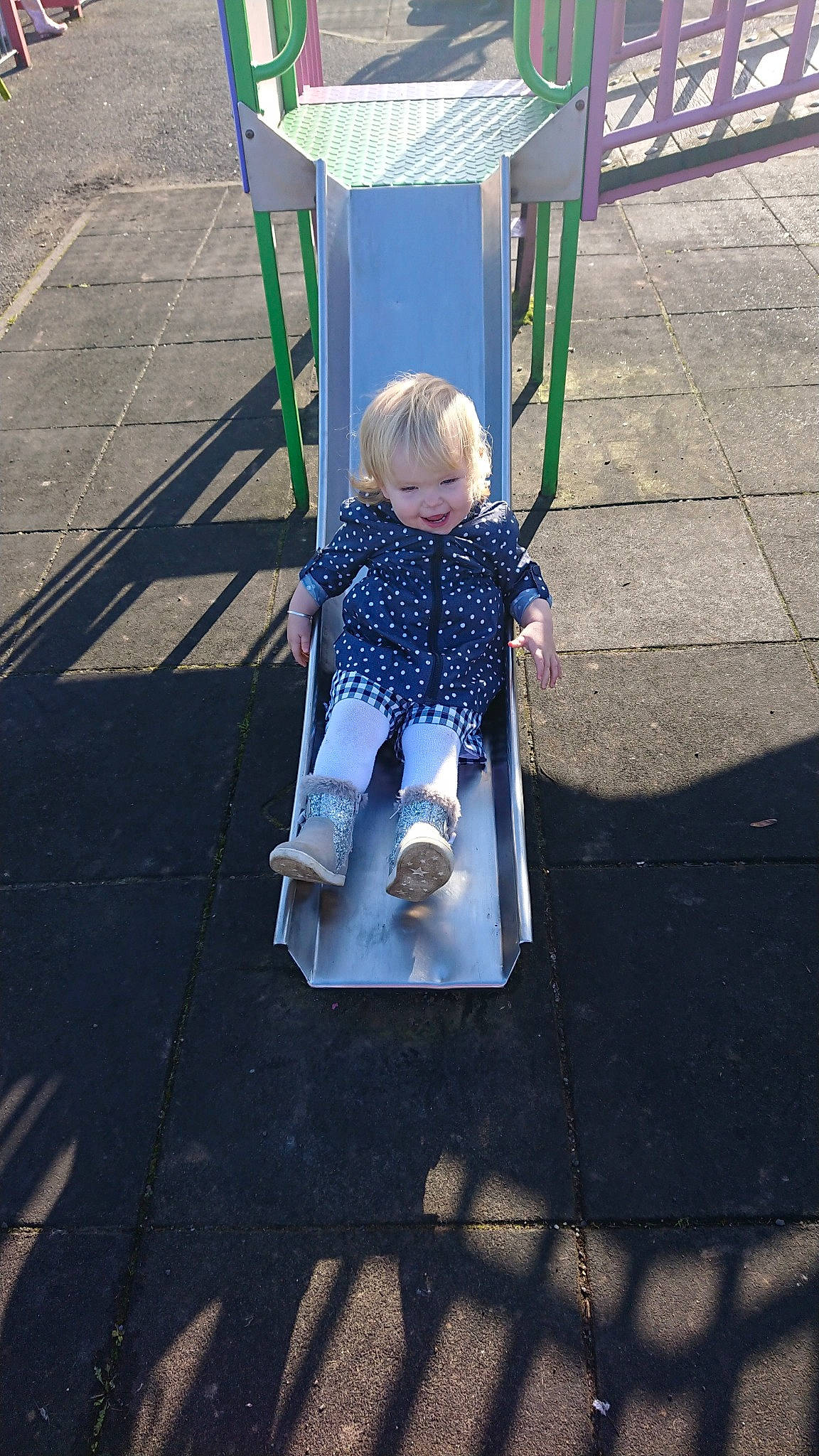 Rebecca is registered to the contest to win money with this photo: child, fun, joy, person, public_space, swing, toddler, tree, vacation