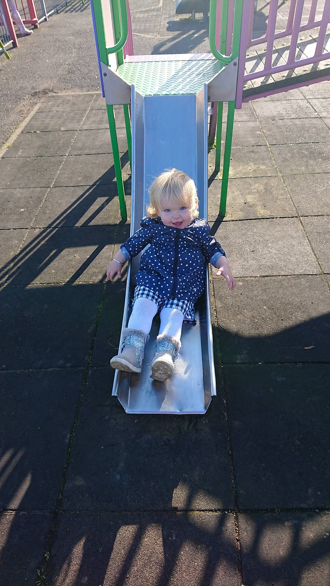 Rebecca is registered to the contest to win money with this photo: baby_carriage, baby_products, child, fun, person, plant, play, playground, product, public_space, tree