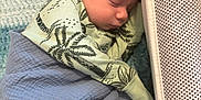 Kasen joined the competition — help win amazing prizes! baby, sleeping, blanket, blue, infant, soft, face, peaceful, closeup, resting, cozy, bed, clothing, pattern, head, skin, newborn, portrait, indoors, comfort