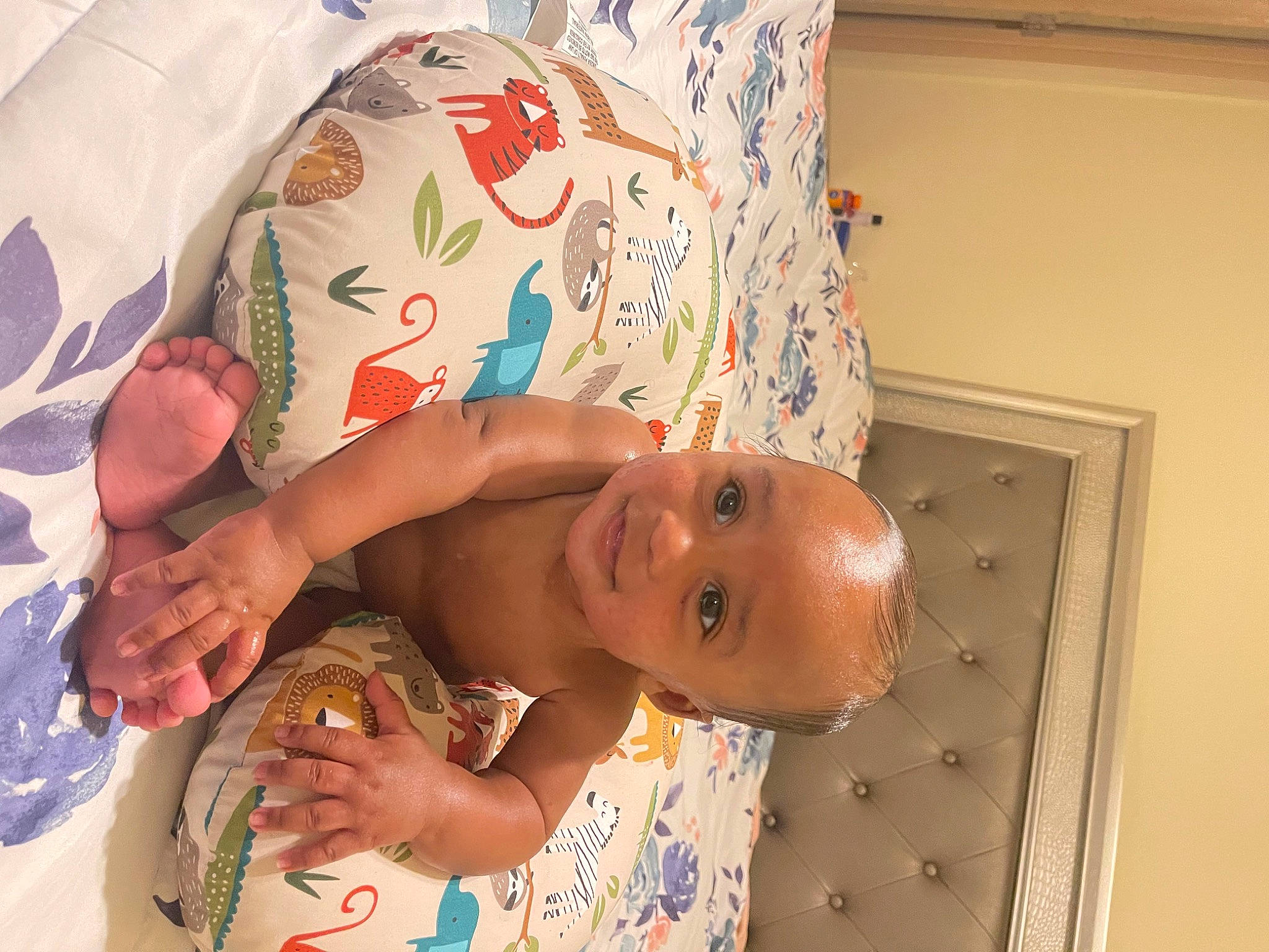 Brendan is registered to the contest to win money with this photo: abdomen, baby, baby_products, baby_toddler_clothing, cheek, chest, child, elbow, eye, fun, hat, joy, linens, mouth, pattern, person, room, skin, smile, stomach