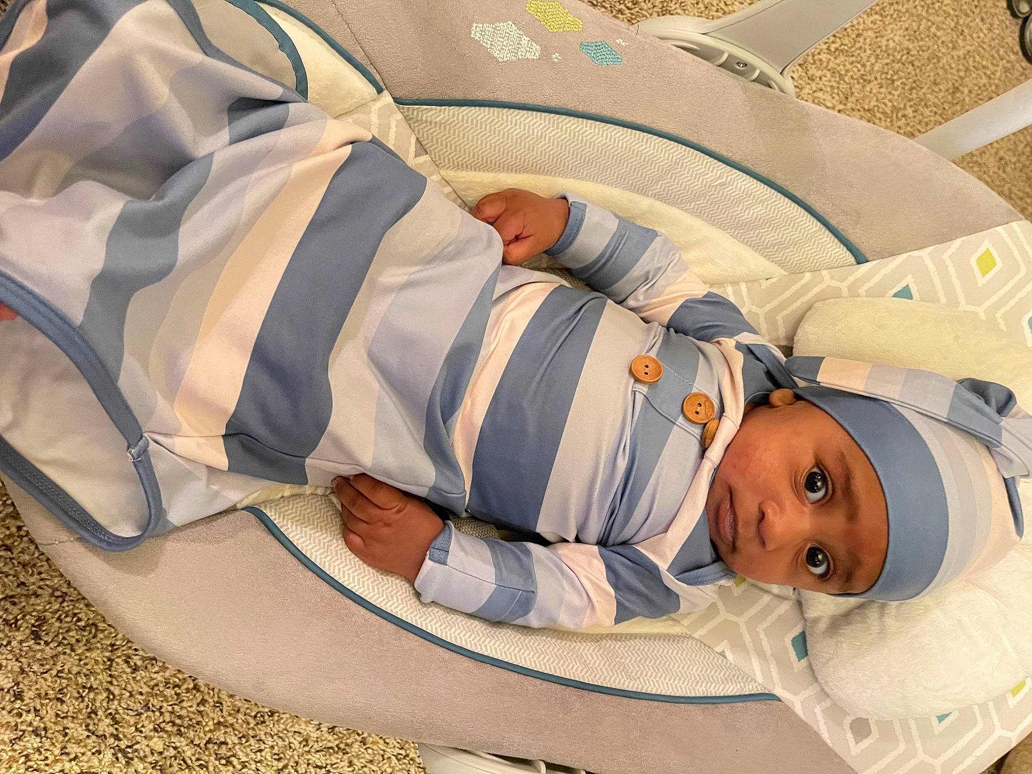 Brendan is registered to the contest to win money with this photo: auto_part, baby, baby_carriage, baby_products, baby_safety, baby_sleeping, baby_toddler_clothing, bag, bedding, bedtime, child, comfort, headwear, infant_bed, leisure, linens, nap, pattern, person, room