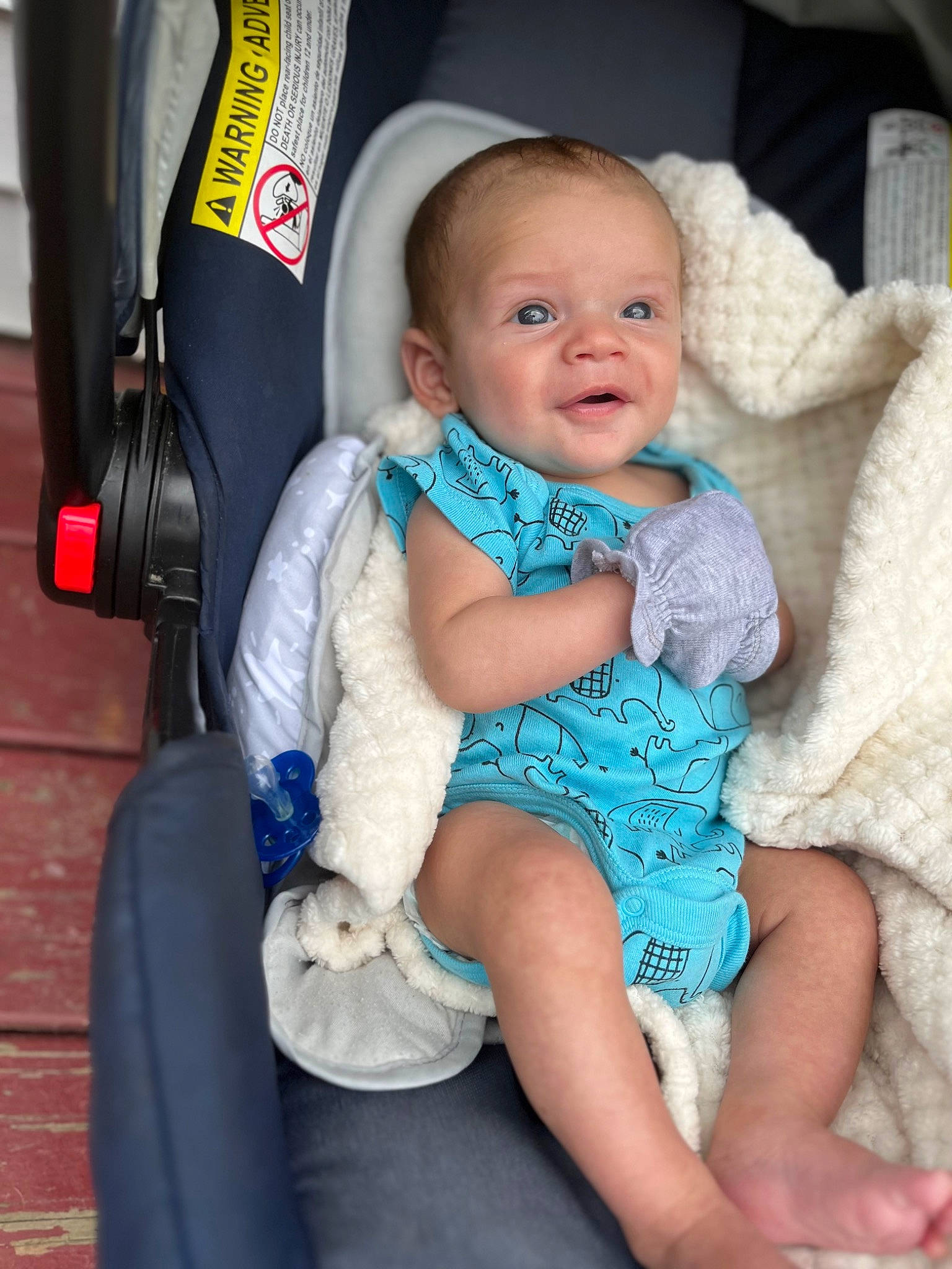 Jett is registered to the contest to win money with this photo: baby, baby_carriage, baby_products, baby_toddler_clothing, car_seat, cheek, child, comfort, electric_blue, event, eye, face, fashion_accessory, finger, happy, iris, person, sitting, skin, smile