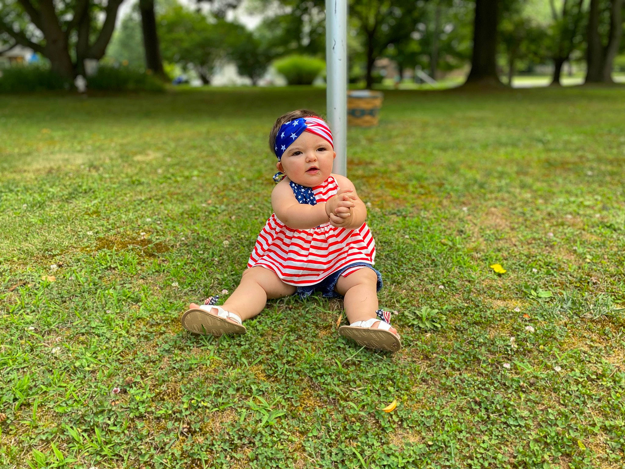 Jenesis is registered to the contest to win money with this photo: baby_toddler_clothing, botany, cap, fun, grass, grass_family, grassland, happy, headwear, lawn, leaf, leisure, meadow, nature, people_in_nature, person, plant, recreation, summer, sunlight