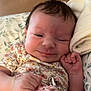 Remington joined the competition — help win amazing prizes! baby, infant, smile, blanket, floral, pillow, bed, sleepy, cute, hand, face, clothing, pattern, soft, comfort, newborn, peaceful, indoors, resting, young