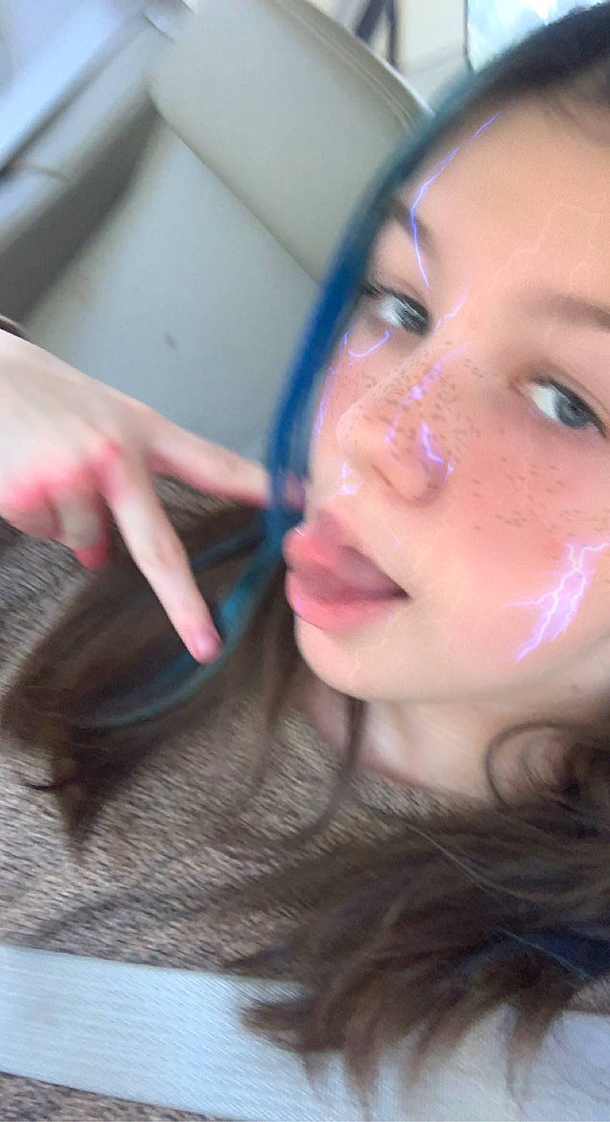 Madisen is registered to the contest to win money with this photo: black_hair, cheek, chin, cool, ear, eyebrow, eyelash, eyewear, finger, forehead, gesture, happy, iris, jaw, lip, mouth, neck, nose, person, skin