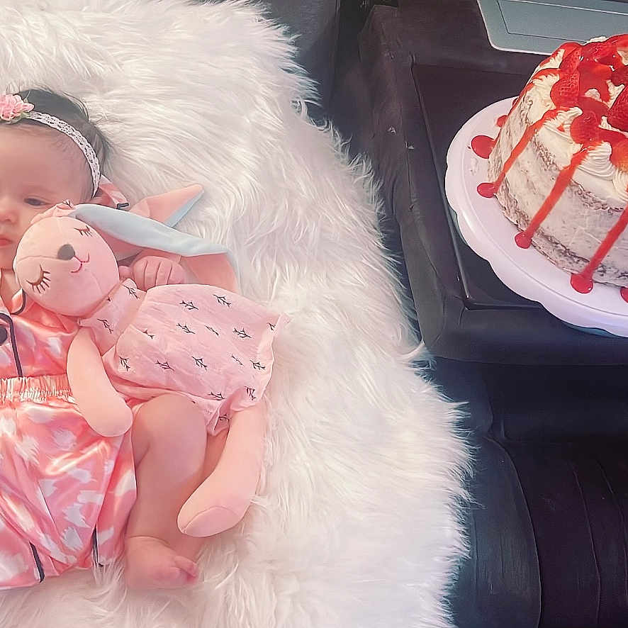 Olivia is registered to the contest to win money with this photo: baby, birthdaycake, cake, clothing, couch, cream, cupcake, cushion, dessert, face, food, furniture, head, homedecor, icing, newborn, people, person, photography, portrait