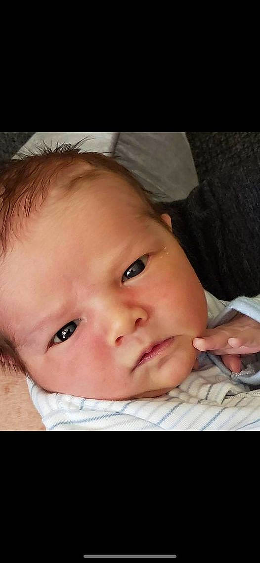 Jonas is registered to the contest to win money with this photo: baby, cheek, ear, eyebrow, eyelash, face, finger, flash_photography, forehead, gesture, hair, happy, iris, jaw, lip, mouth, neck, nose, person, skin