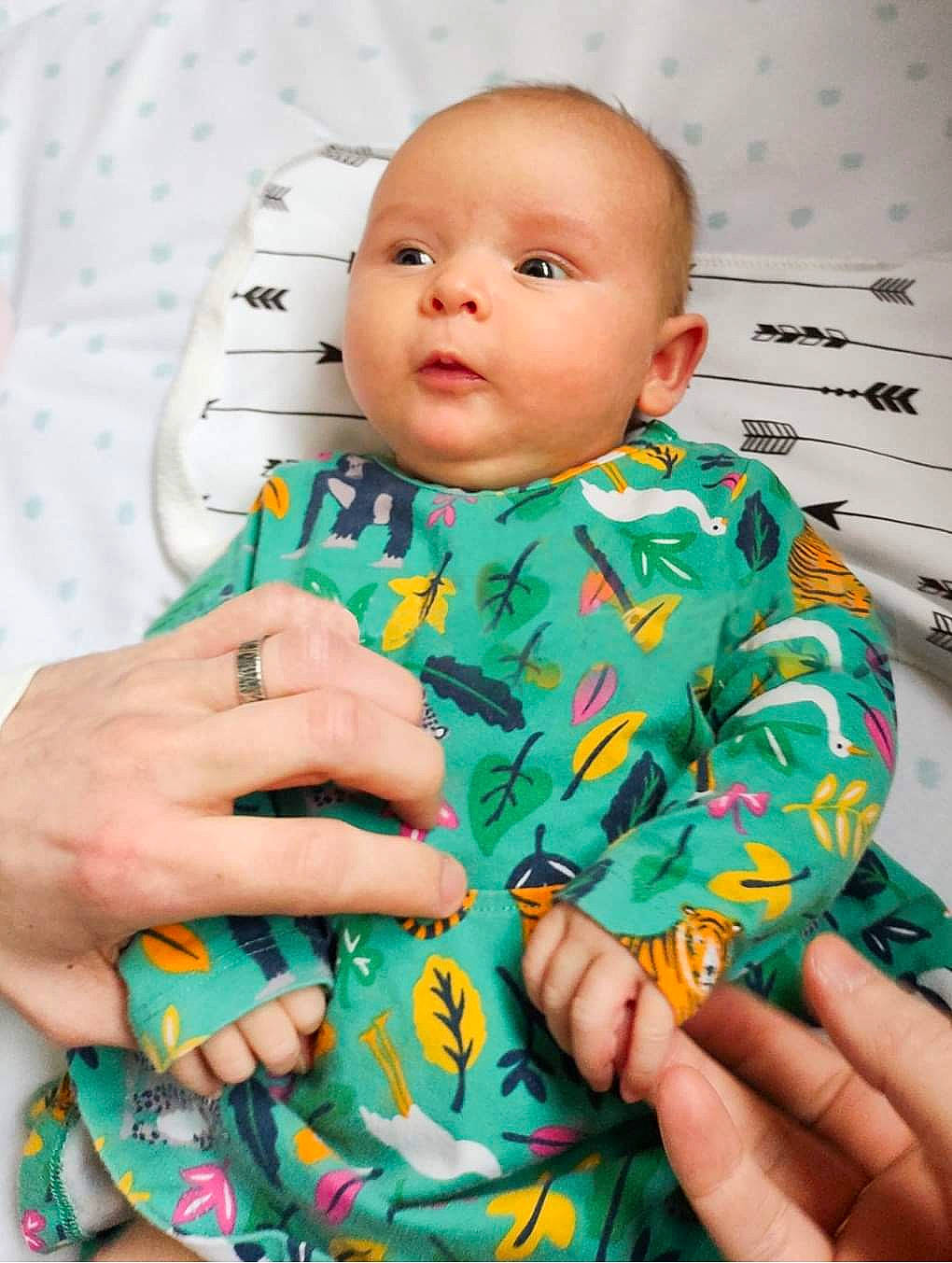 Edie joined the competition — help win amazing prizes! baby, baby_toddler_clothing, cheek, child, computer_keyboard, electric_blue, finger, gesture, hand, happy, input_device, linens, nail, pattern, peripheral, person, room, skin, sleeve, thumb