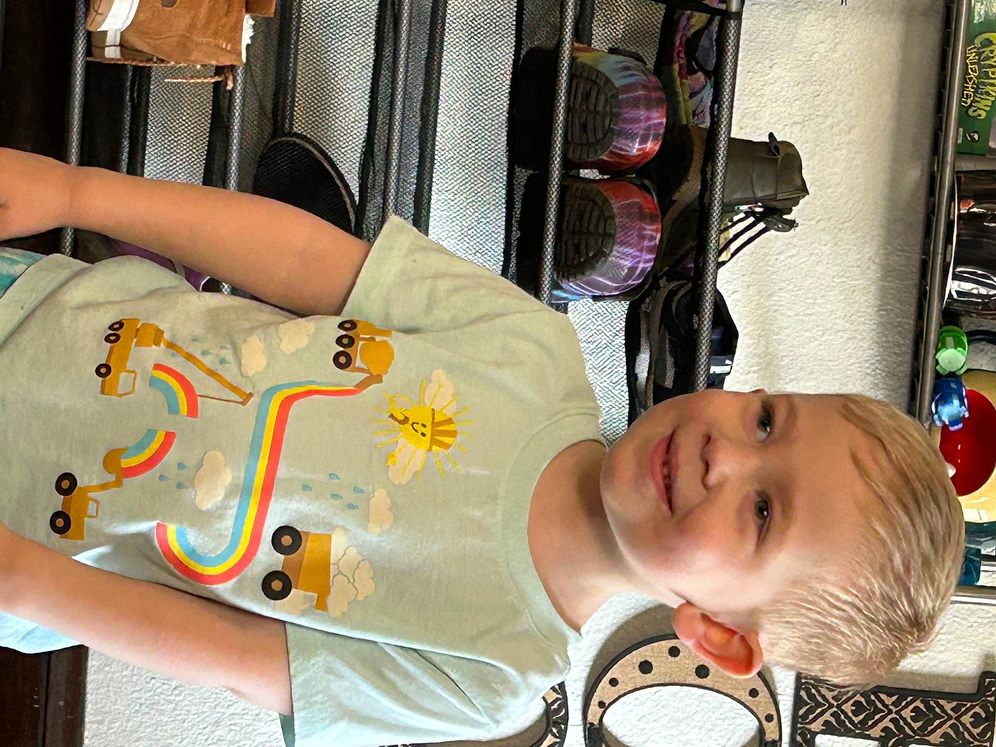 Ian joined the competition — help win amazing prizes! baby, baby_products, baby_toddler_clothing, chair, child, elbow, fun, joy, mouth, person, room, smile, t_shirt, toddler