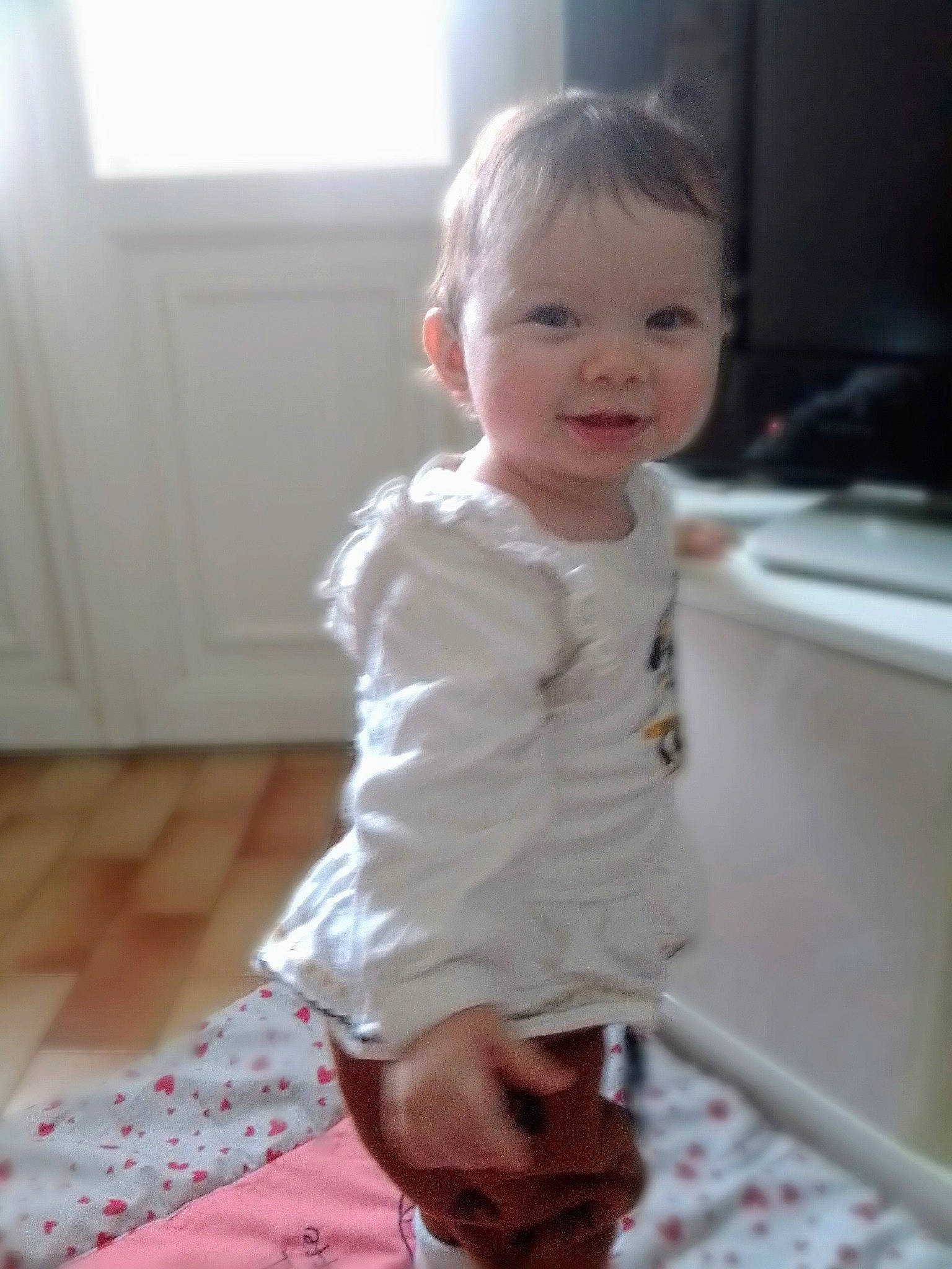 Olivia a rejoint le concours — aidez-le/la à gagner de superbes lots ! baby, baby_toddler_clothing, cheek, child, dress, facial_expression, head, leg, person, pink, skin, sleeve, smile, standing, toddler