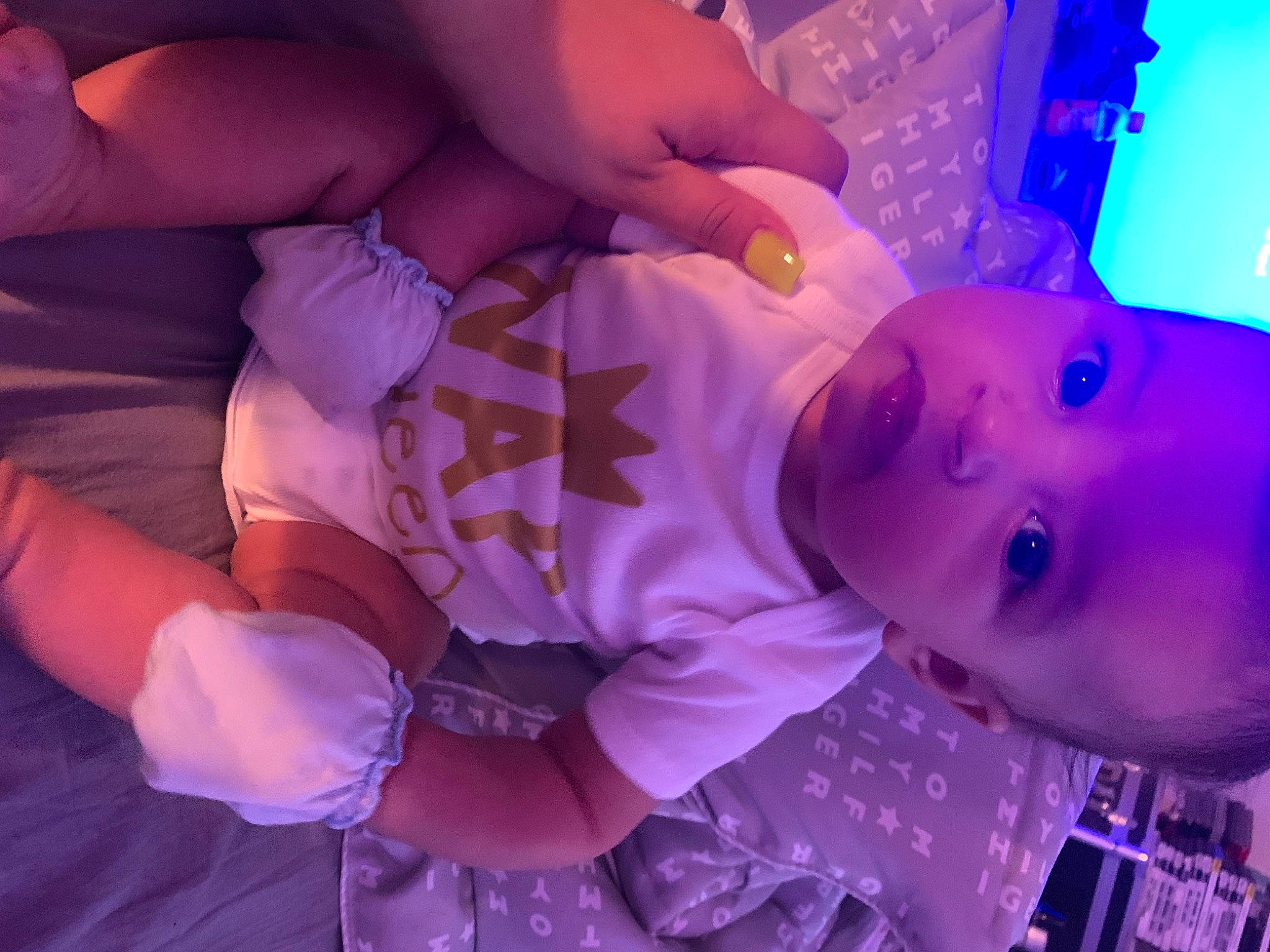 Makyla is registered to the contest to win money with this photo: baby, baby_toddler_clothing, blue, child, cloud, electric_blue, eye, eyelash, finger, fun, hand, human_body, iris, magenta, mouth, person, pink, purple, skin, toddler