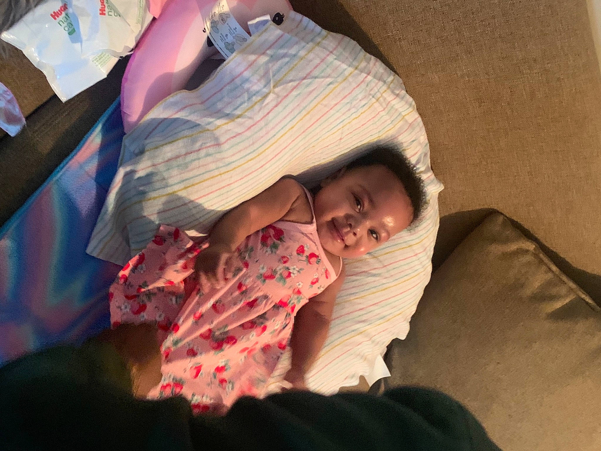 Alana joined the competition — help win amazing prizes! baby, baby_products, bedding, bedtime, child, comfort, event, flesh, fun, human_leg, linens, magenta, mouth, nap, person, room, sitting, sleep, smile, textile