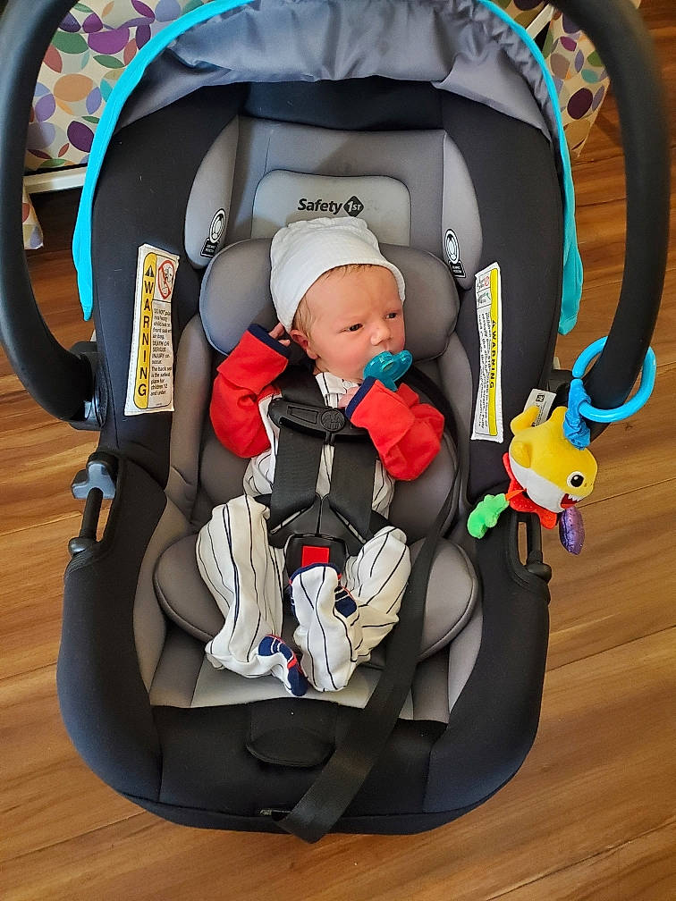 Lewis joined the competition — help win amazing prizes! auto_part, automotive_design, baby, baby_carriage, baby_products, baby_toys, bag, car_seat, child, circle, comfort, facial_expression, fun, person, play, product, recreation, sitting, toddler, toy