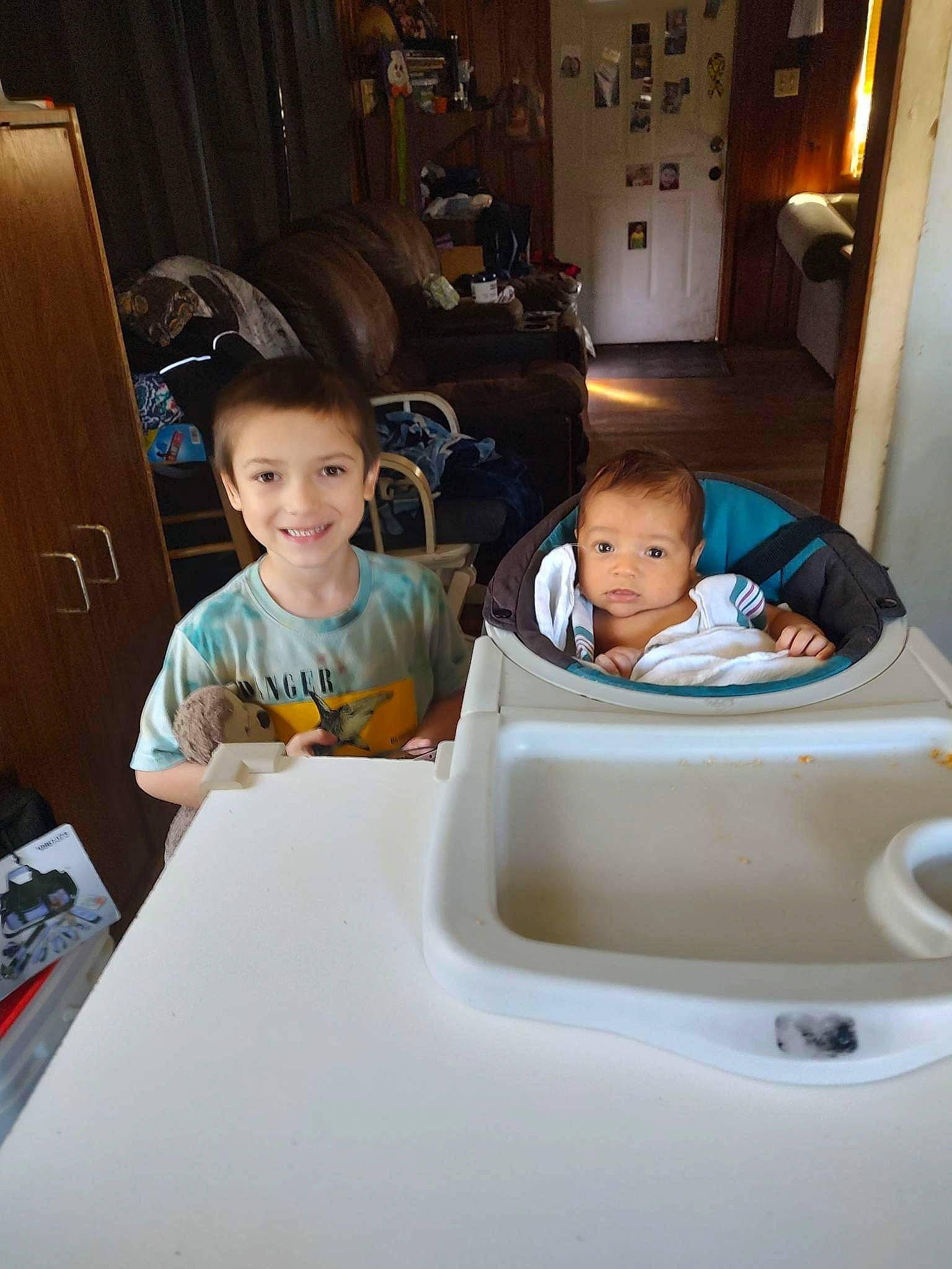 Isaac joined the competition — help win amazing prizes! child, comfort, curtain, door, event, flooring, fun, hairstyle, joy, lamp, person, room, sitting, sleeve, smile, t_shirt, toddler, vacation, wood