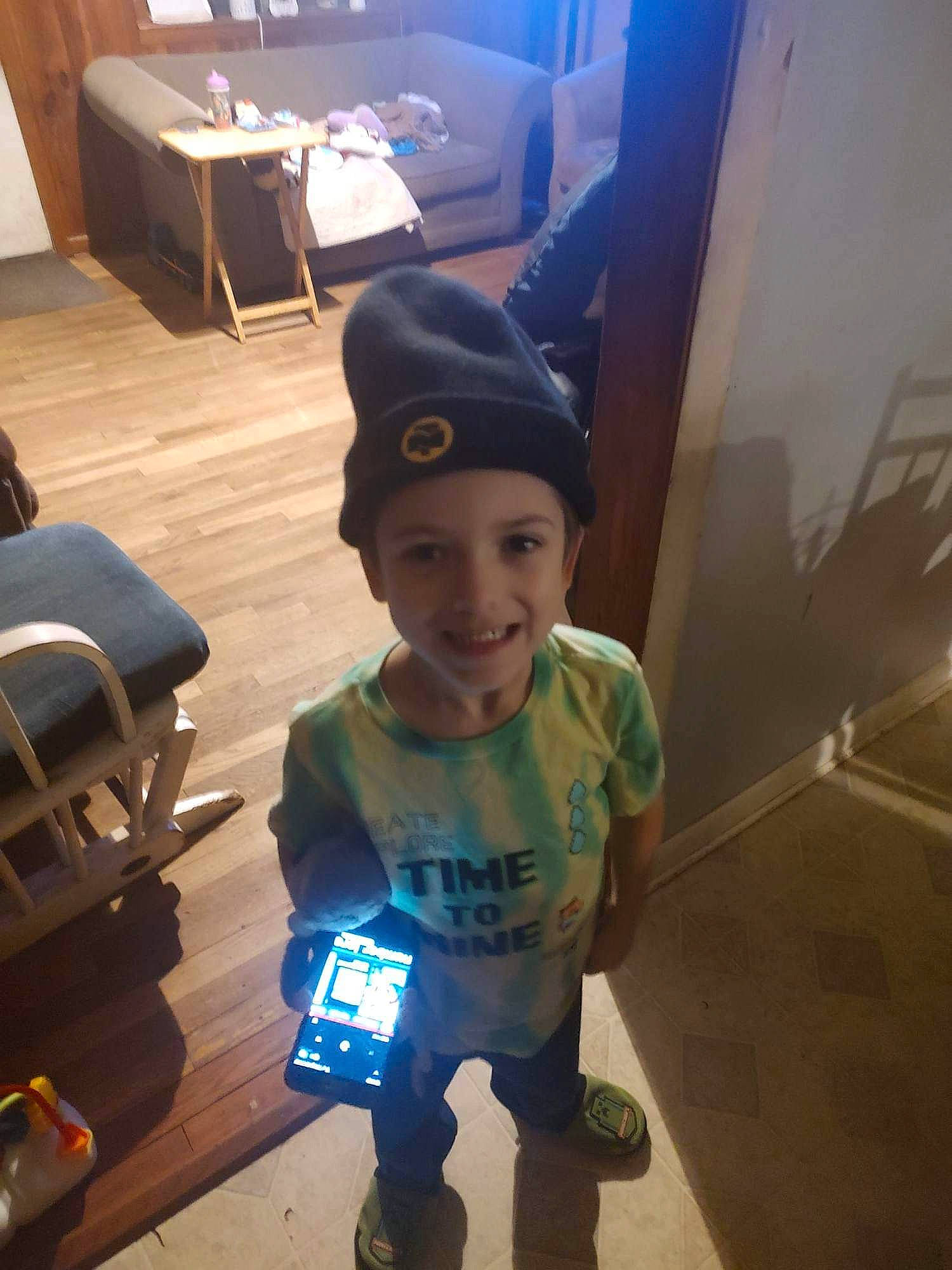 Isaac joined the competition — help win amazing prizes! baseball_cap, cap, chair, child, electric_blue, flooring, fun, happy, headwear, joy, metal, person, personal_protective_equipment, room, selfie, sitting, sleeve, smile, standing, t_shirt