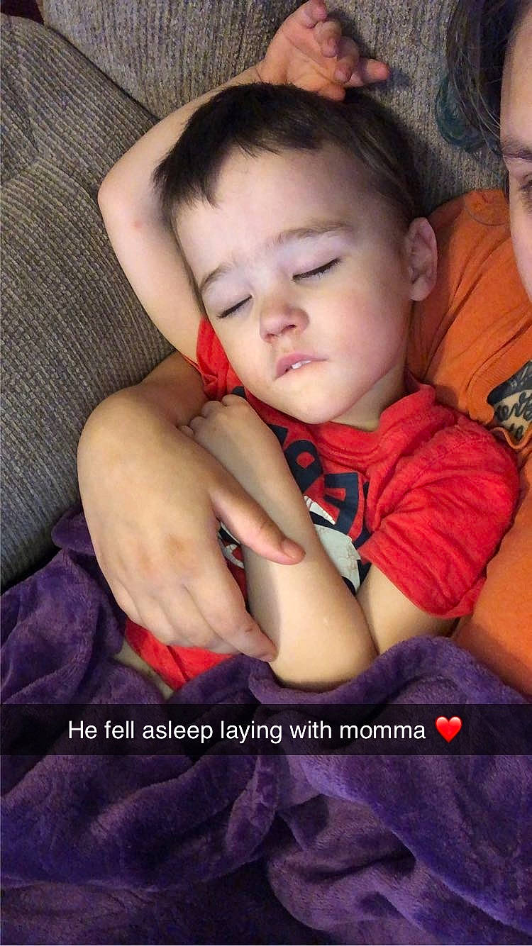 Colter is registered to the contest to win money with this photo: baby, child, comfort, finger, flash_photography, fun, gesture, happy, hug, love, nail, nose, pattern, person, photo_caption, portrait_photography, sitting, textile, thumb, toddler