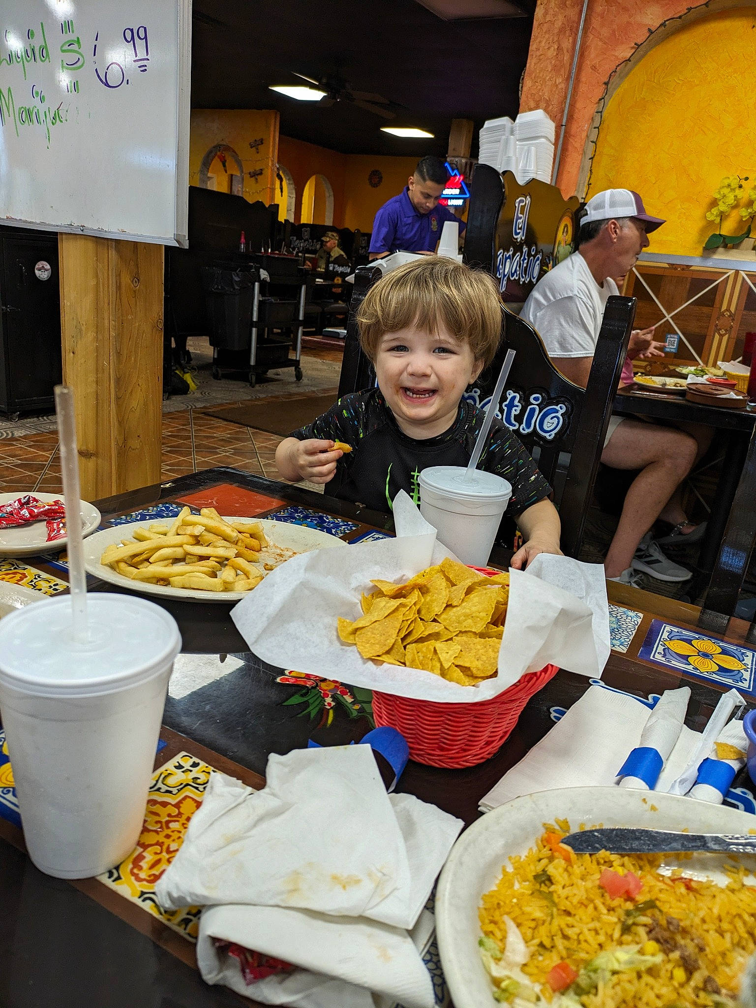 Dustin is registered to the contest to win money with this photo: bowl, chair, comfort_food, cooking, cuisine, dish, event, fast_food, finger_food, food, hat, headwear, ingredient, joy, junk_food, person, plate, recipe, smile, t_shirt