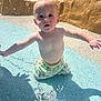 barechest, blue, child, expression, fun, happy, outdoor, play, pool, rock, shadow, skin, splash, summer, sunlight, swimwear, texture, toddler, water, wet