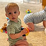 baby, bright, carpet, carpeted_floor, casual_clothing, child, crawling, curious, cute, floor, home, indoor, infant, kneeling, person, playing, striped_clothes, toddler, toy, young_child