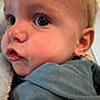 Koah is registered to the contest to win money with this photo: baby, cheeks, child, childhood, close_up, clothing, cute, expression, eyes, face, head, hoodie, indoors, infant, lips, person, portrait, skin, soft, young