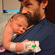 Leonard Unsicker joined the competition — help win amazing prizes! newborn, baby, man, beard, hospital, iv_line, wristband, blanket, sleeping, skin, face, portrait, indoor, person, love, family, care, comfort, healthcare, tenderness