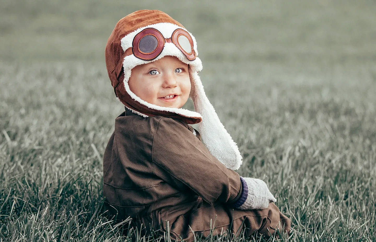 Raylan joined the competition — help win amazing prizes! baby, cap, eyewear, flash_photography, goggles, grass, grass_family, grassland, happy, headgear, headwear, landscape, lawn, meadow, people_in_nature, person, plant, smile, standing, sunglasses