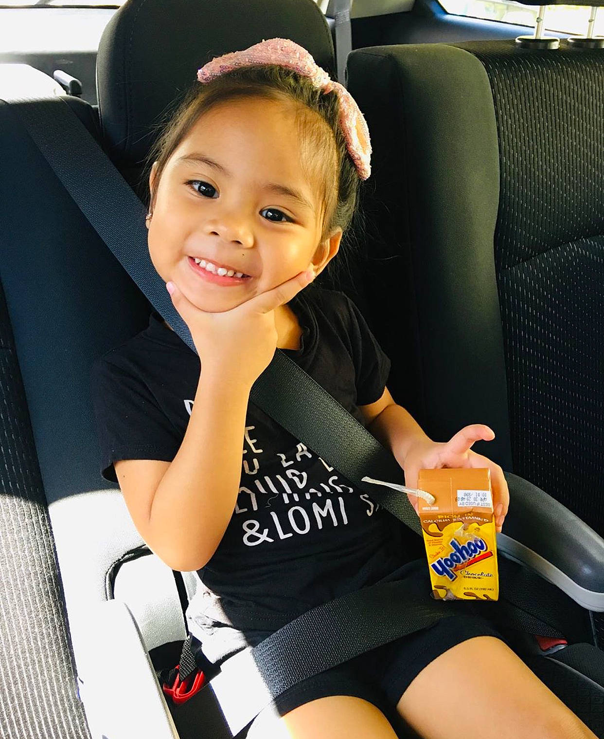 Leanne is registered to the contest to win money with this photo: arm, auto_part, baby_in_car_seat, car, car_seat, car_seat_cover, child, family_car, head_restraint, joy, leg, person, seat_belt, sitting, smile, thigh, vehicle