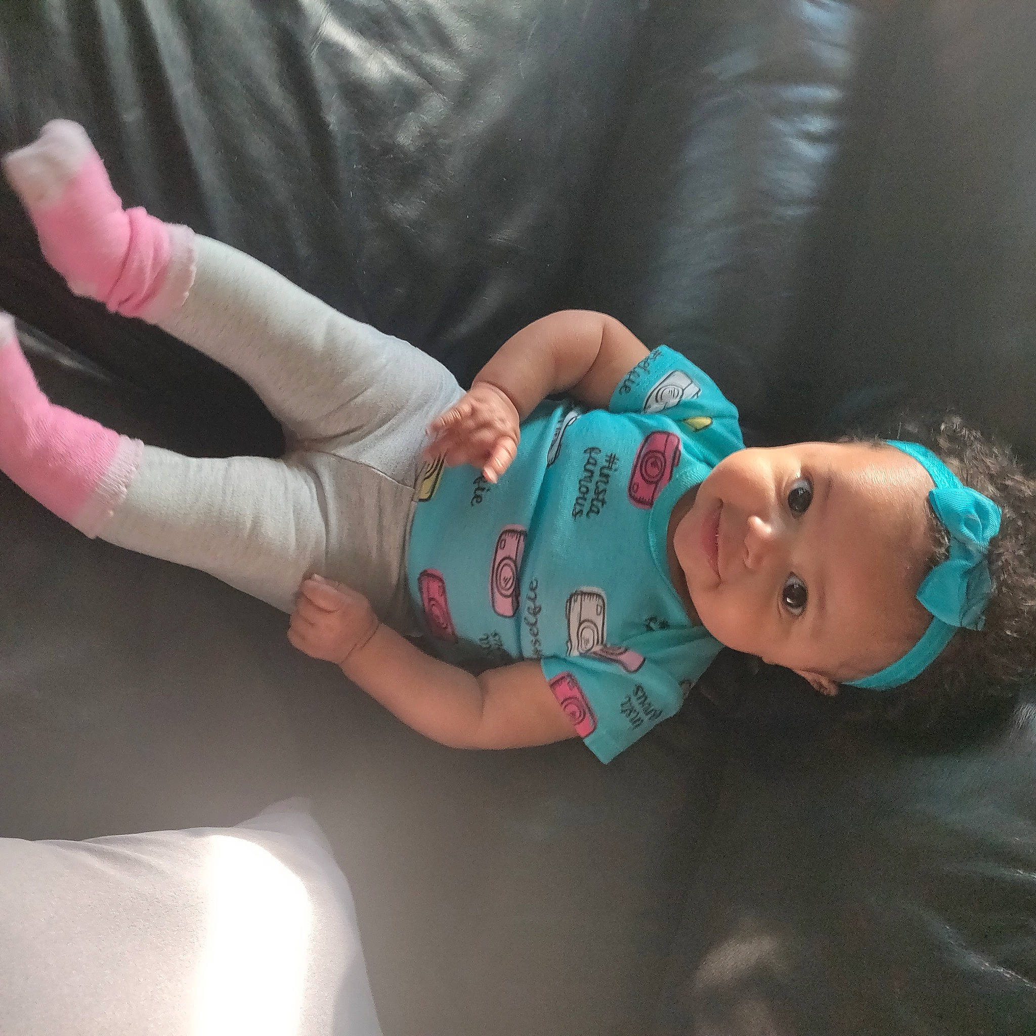 Lilyona is registered to the contest to win money with this photo: arm, baby, birth, child, finger, hand, joint, leg, person, skin, toddler, turquoise