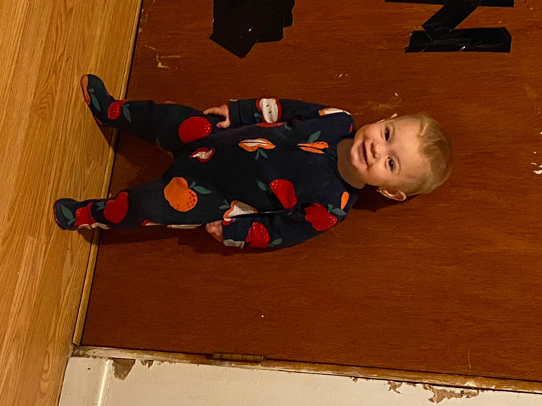 Kayleigh is registered to the contest to win money with this photo: baby, baby_toddler_clothing, brown, carmine, child, floor, flooring, fun, hardwood, joy, line, orange, pattern, person, play, shadow, sitting, tints_and_shades, toddler, wood