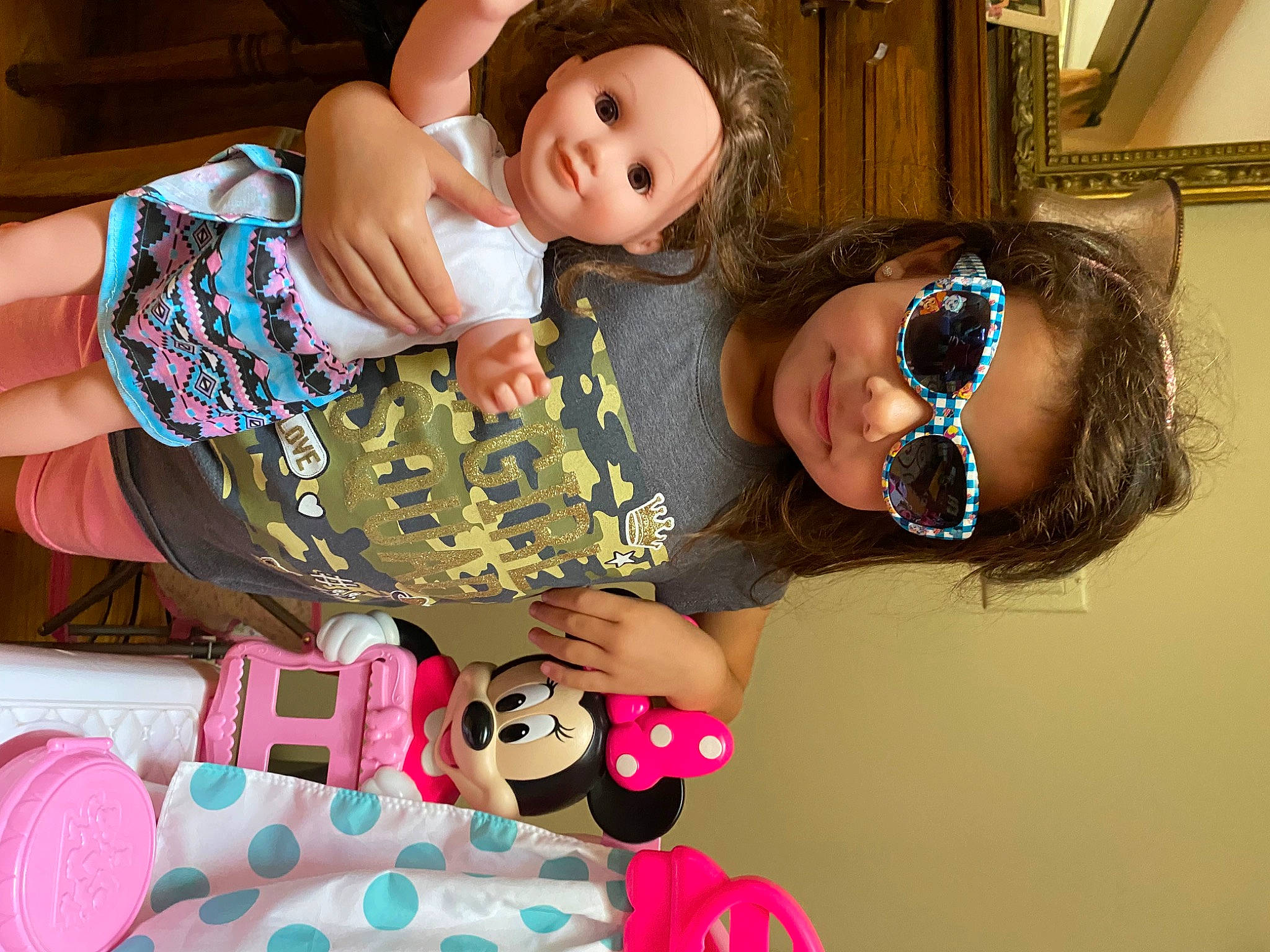 Isabel is registered to the contest to win money with this photo: baby, baby_toddler_clothing, beauty, cheek, child, design, event, facial_expression, finger, fun, happy, leisure, mouth, organ, pattern, person, pink, room, skin, smile