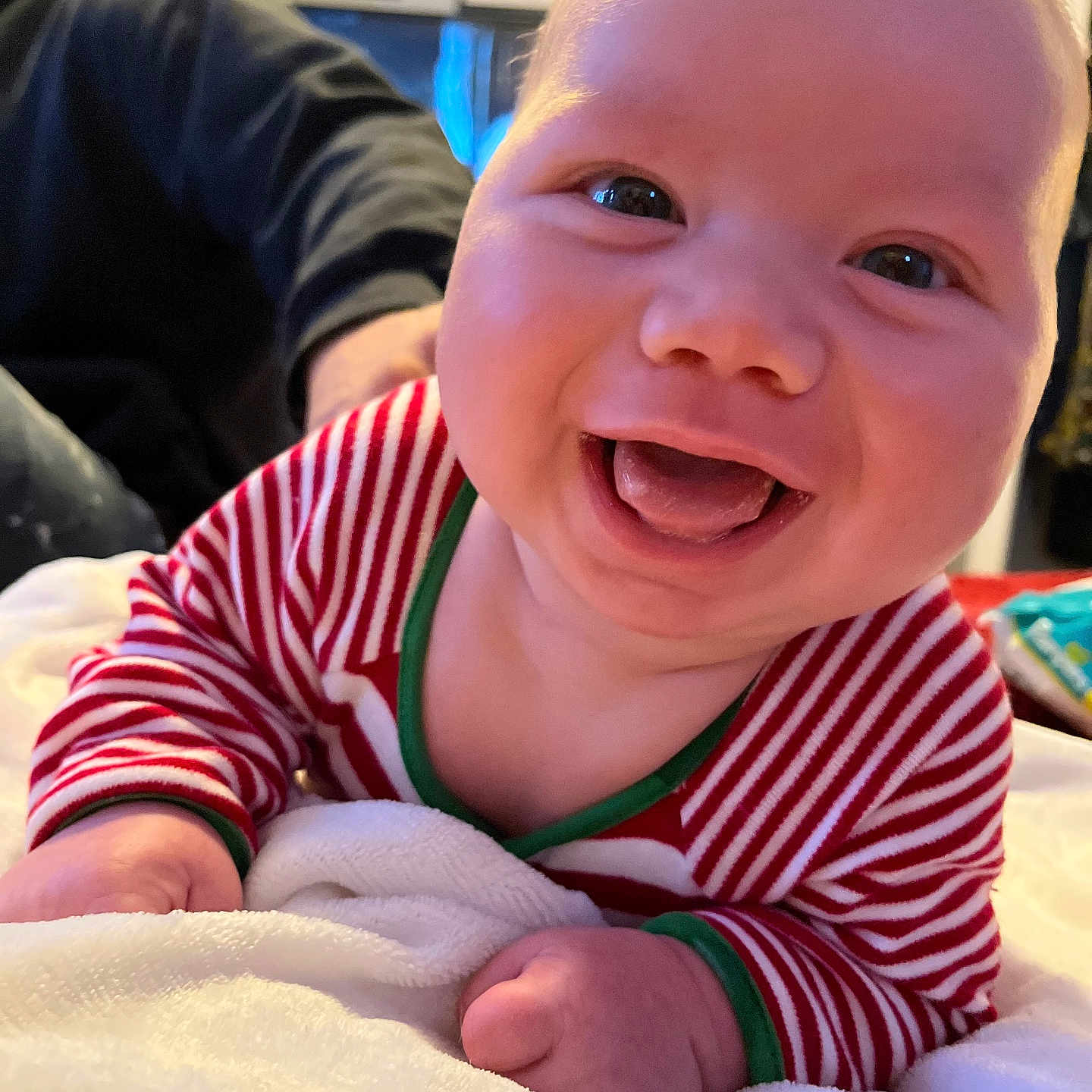 Kamari joined the competition — help win amazing prizes! baby, babylaughing, bed, bodypart, clothing, face, finger, furniture, hand, happy, head, indoors, laughing, mouth, person, photography, portrait, smile, t_shirt, teeth