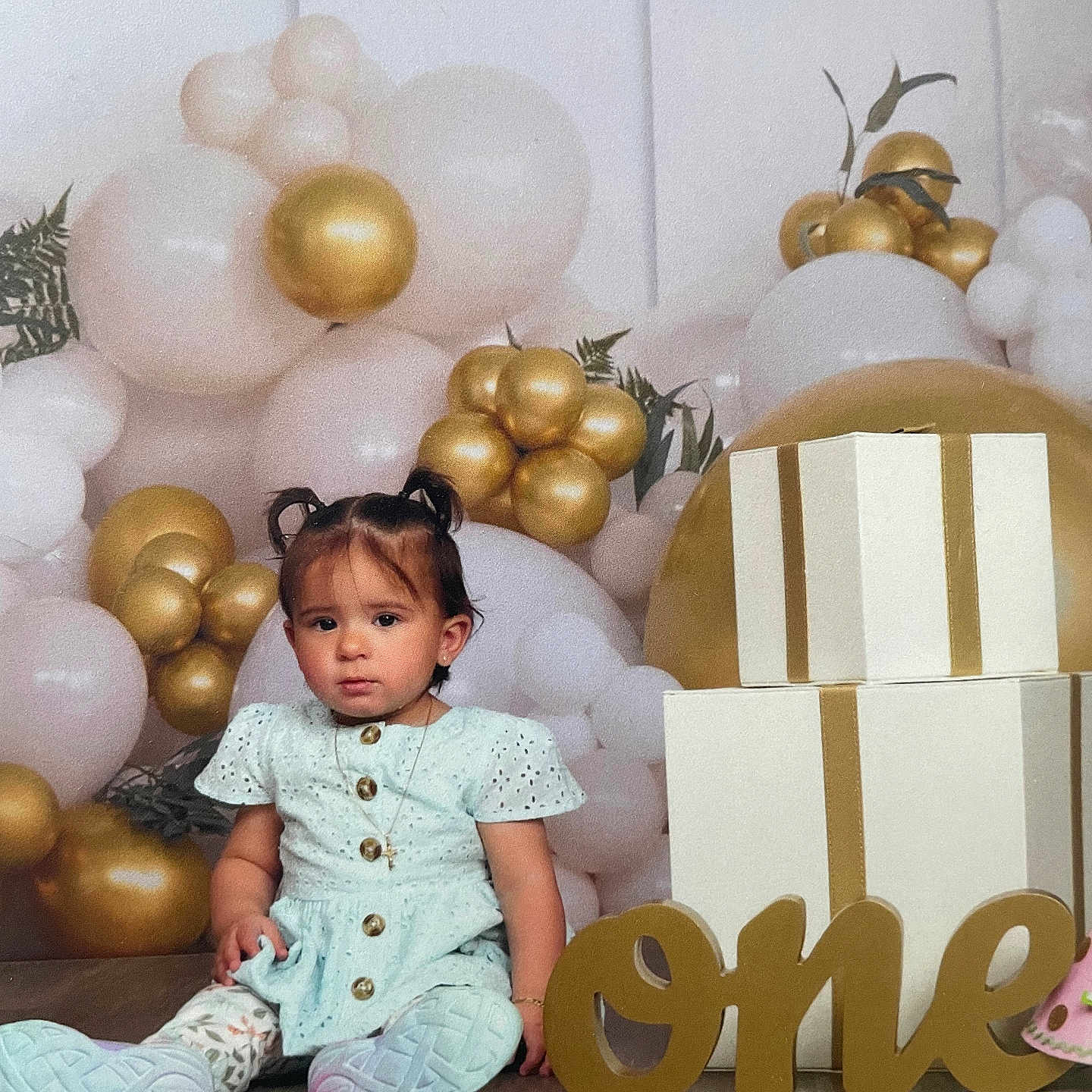 Mckinlee is registered to the contest to win money with this photo: accessories, baby, balloon, box, clothing, face, festival, head, jewelry, necklace, number, pants, people, person, photography, portrait, sitting, sleeve, symbol, text