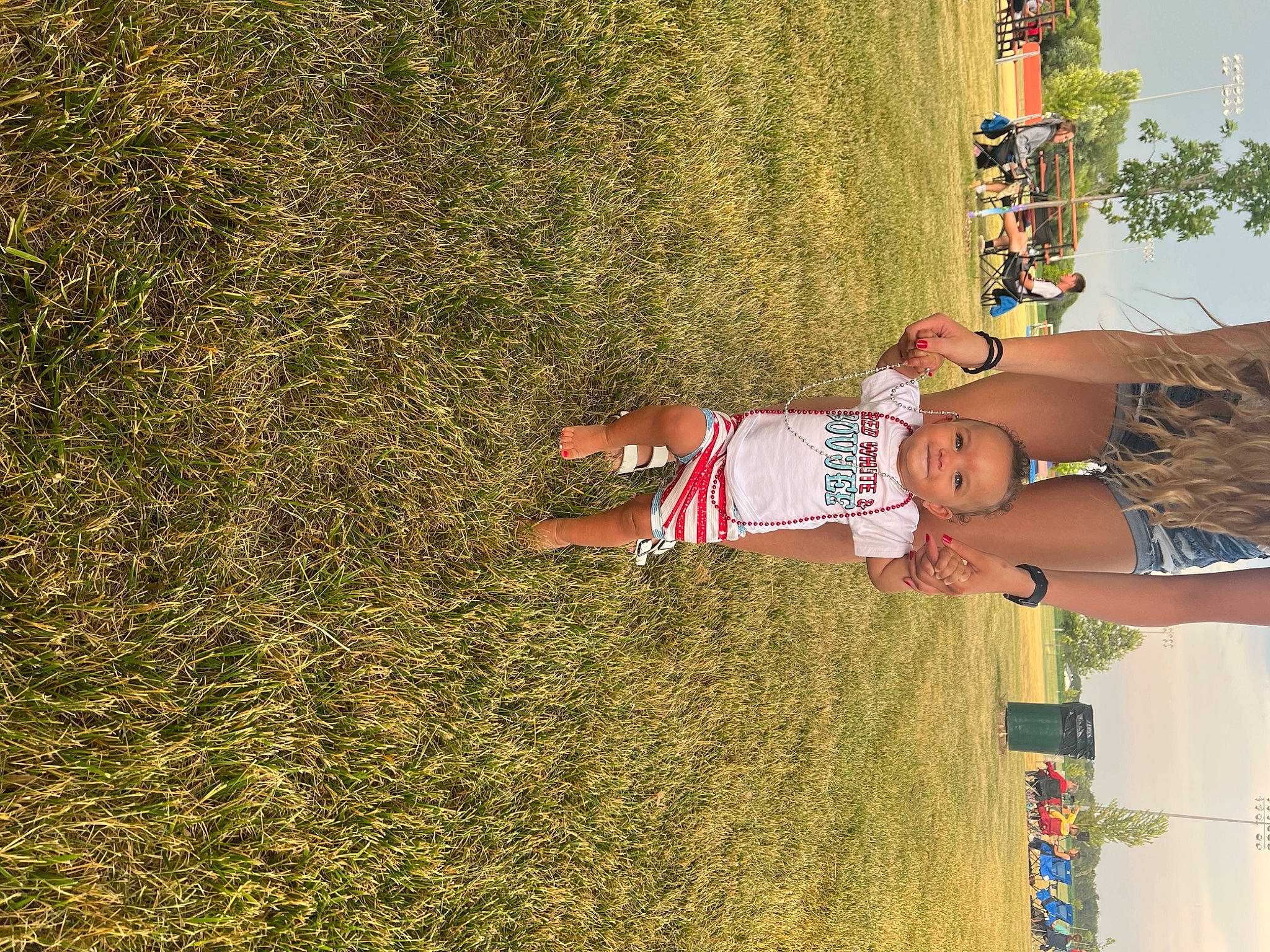 Emery is registered to the contest to win money with this photo: child, fun, grass, grassland, happy, hat, house, joy, landscape, leisure, people_in_nature, person, plant, recreation, shadow, shrub, smile, soil, sunglasses, tints_and_shades