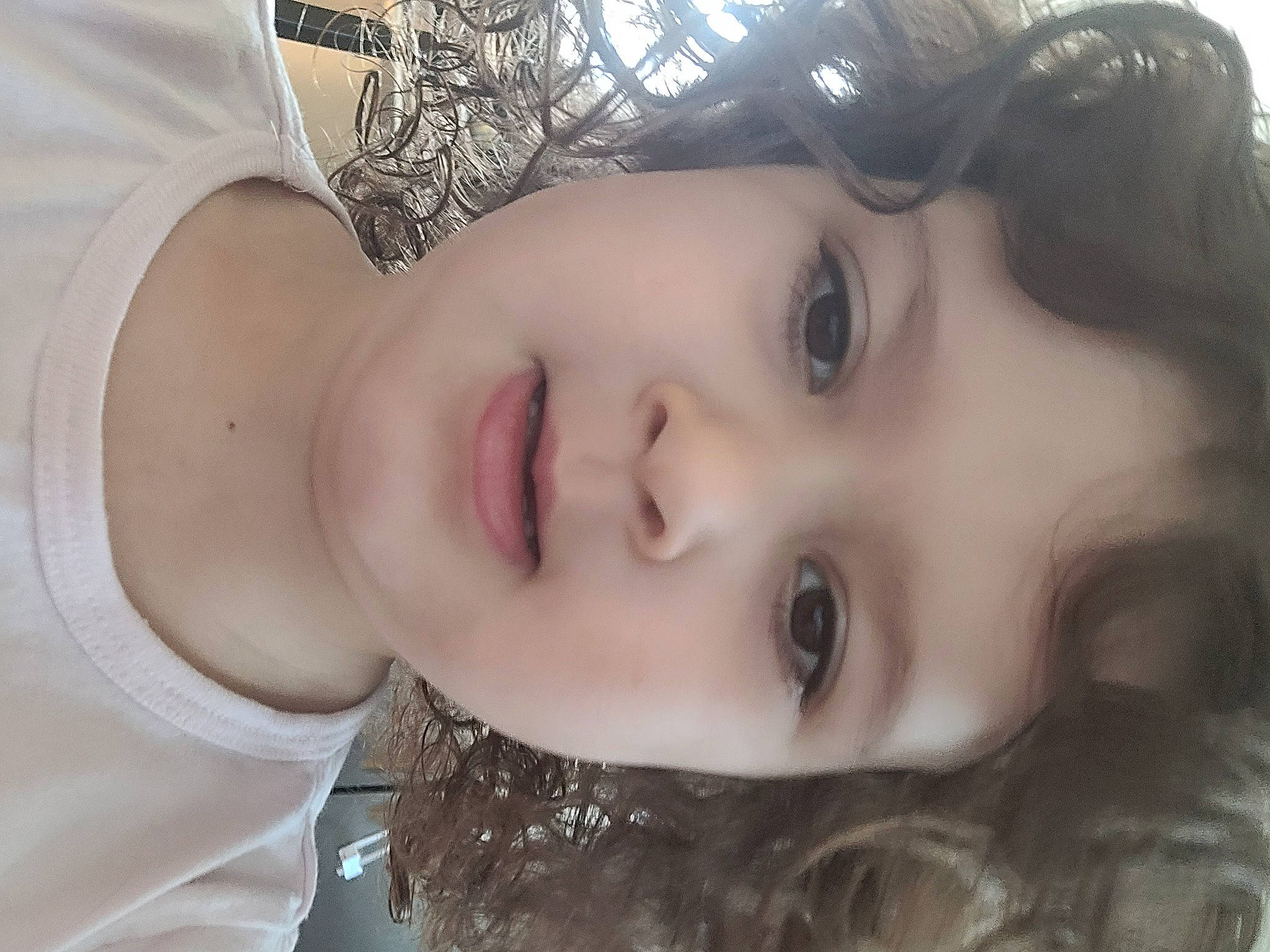 Tessa is registered to the contest to win money with this photo: black_hair, cheek, chin, cool, ear, eye, eyebrow, eyelash, flash_photography, forehead, happy, iris, jaw, lip, mouth, nose, person, plant, skin, smile