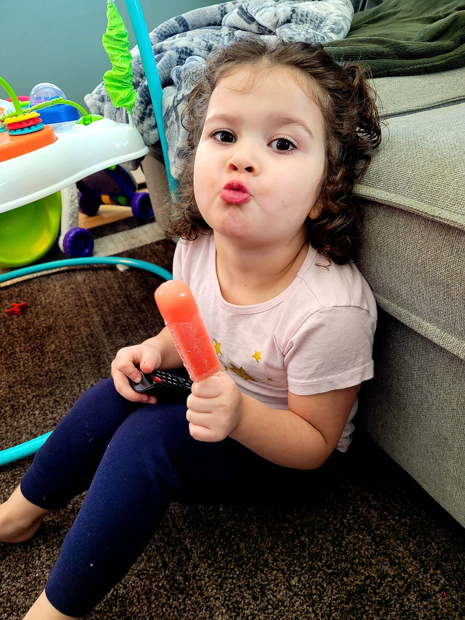 Tessa joined the competition — help win amazing prizes! baby_playing_with_toys, baby_toddler_clothing, child, eye, face, fun, grass, happy, head, human_leg, iris, leisure, person, pink, shoe, sitting, skin, sneakers, t_shirt, thigh