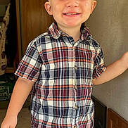 Wayland Bragg is registered to the contest to win money with this photo: background, blonde_hair, boy, casual, child, clothing, cute, face, hair, happy, home, indoors, jeans, person, plaid_shirt, portrait, short_sleeve, smile, standing, young