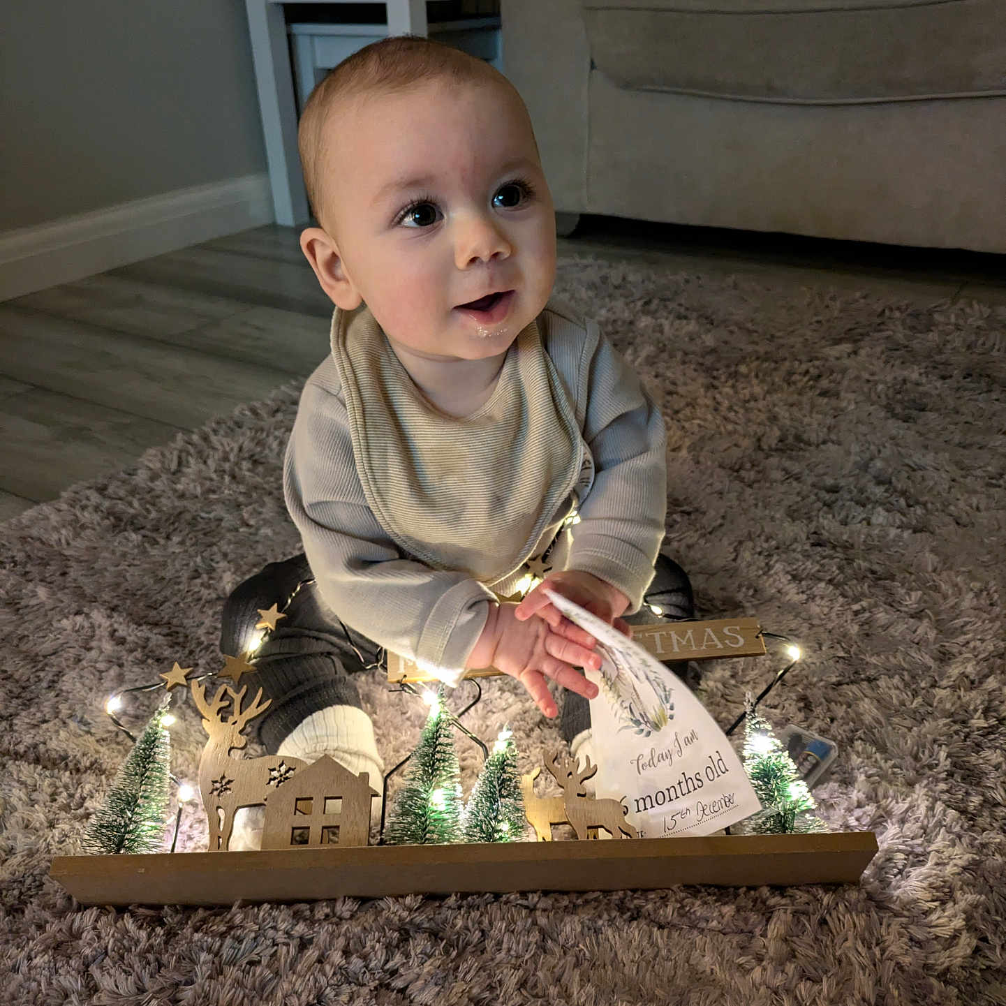Edison is registered to the contest to win money with this photo: architecture, baby, birthdaycake, bodypart, building, cake, couch, face, finger, furniture, hand, head, indoors, livingroom, person, photography, portrait, room, sitting, wood