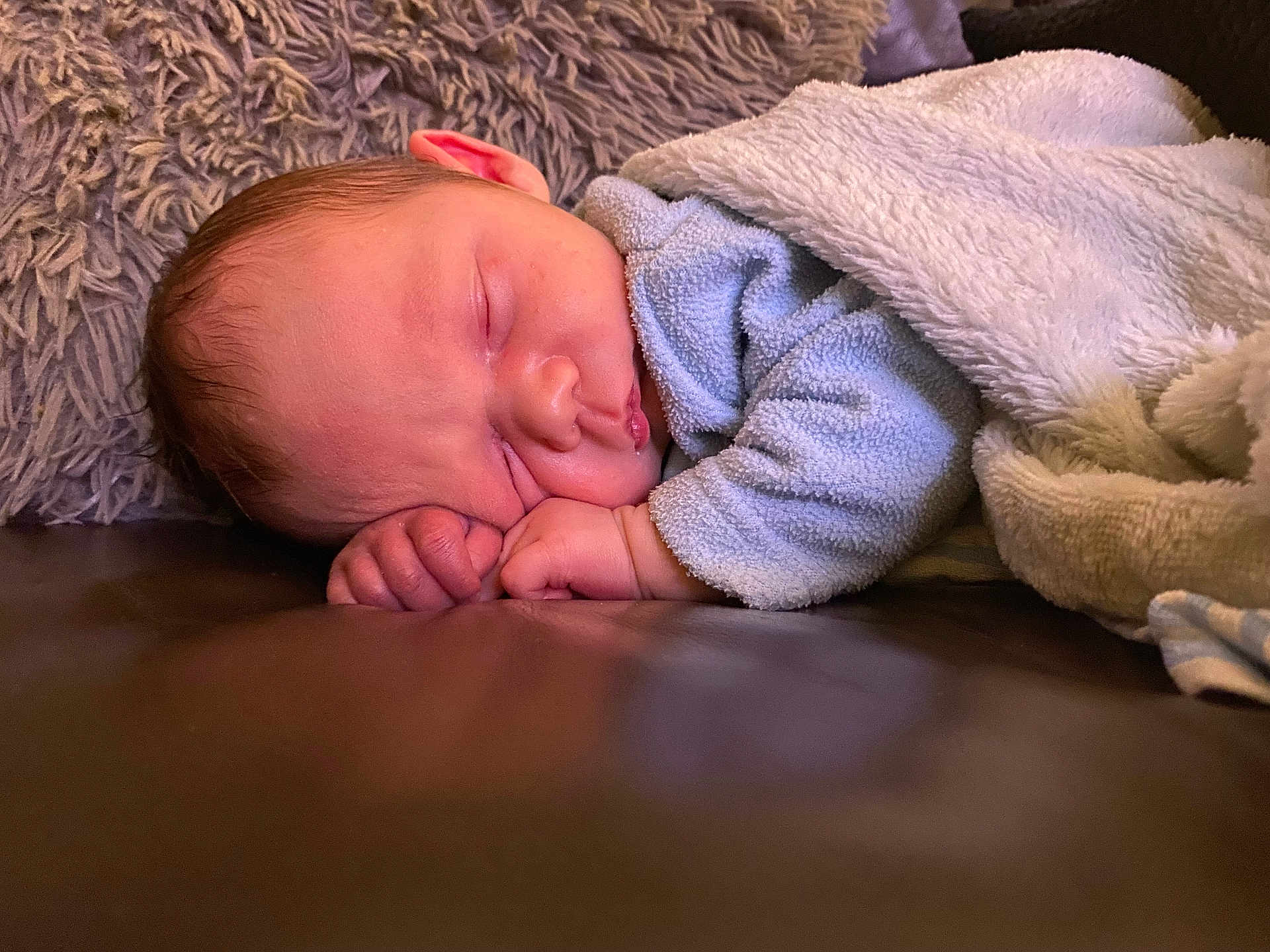 Lennox joined the competition — help win amazing prizes! baby, newborn, sleeping, blanket, cozy, soft, infant, face, peaceful, closeup, couch, rest, comfort, child, skin, hand, head, warm, portrait, indoors